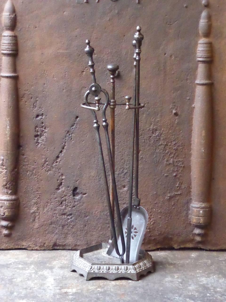 19th century English fireplace tool set, fire irons made of wrought iron and cast iron.

We have a unique and specialized collection of antique and used fireplace accessories consisting of more than 1000 listings at 1stdibs. Amongst others, we