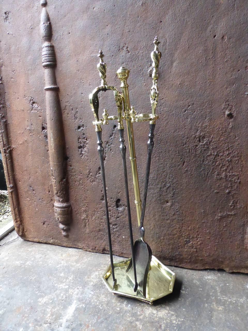 19th century French fireplace tool set - fire irons made of polished brass and wrought iron.

We have a unique and specialized collection of antique and used fireplace accessories consisting of more than 1000 listings at 1stdibs. Amongst others, we