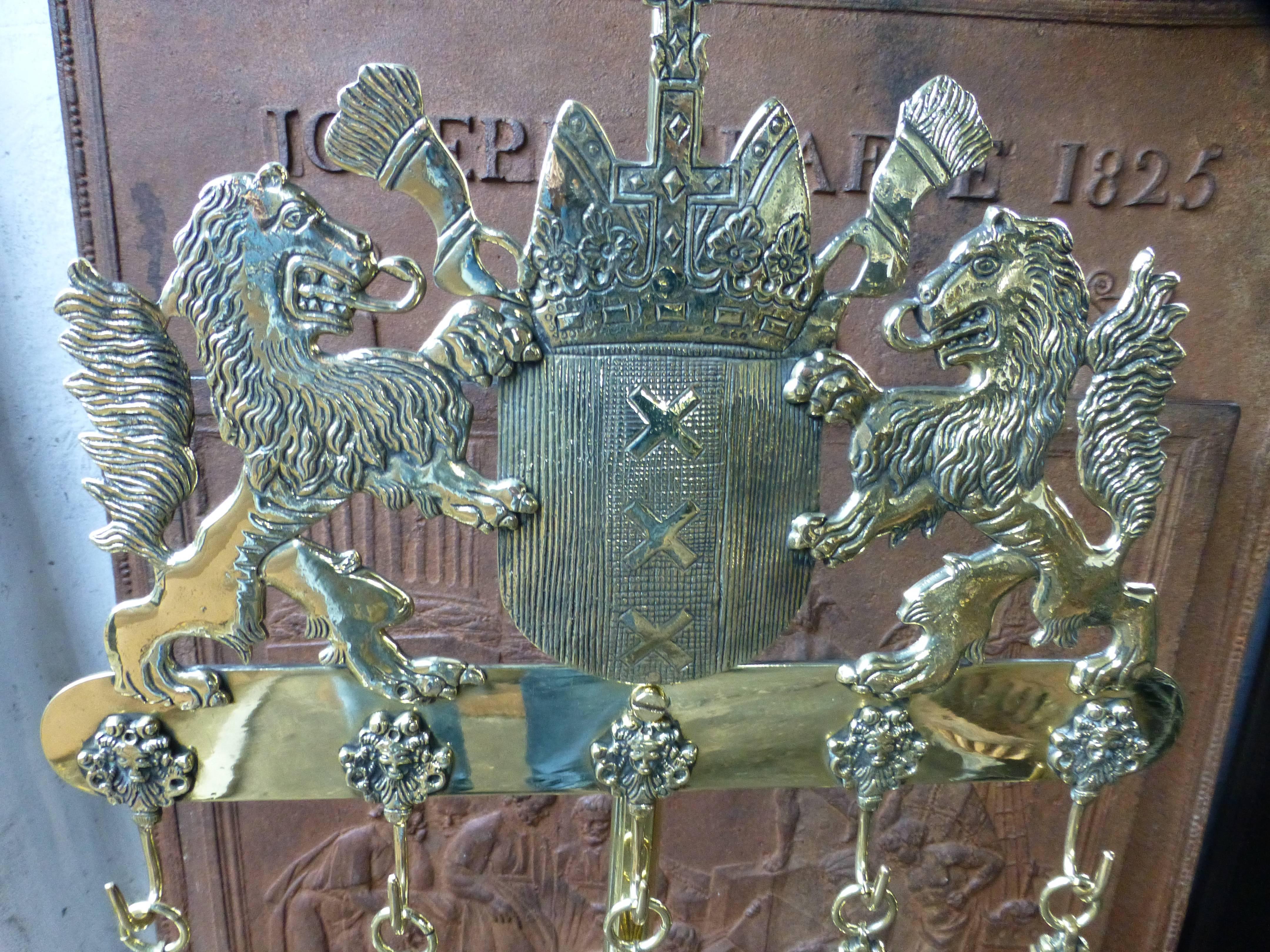 Exceptionally heavy and sturdy fire tool set with the coat of arms of Amsterdam. 19th Century.

We have a unique and specialized collection of antique and used fireplace accessories consisting of more than 1000 listings at 1stdibs. Amongst others we