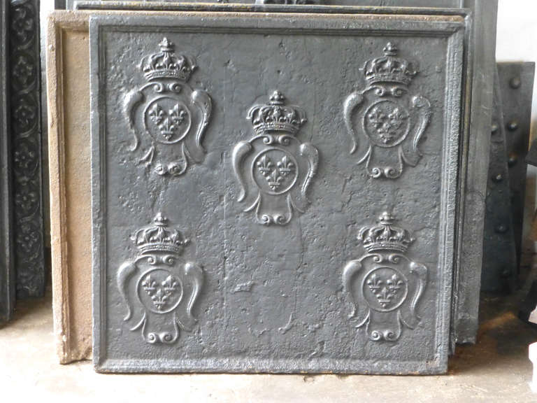 Plaque de cheminée ancienne fonte fleur de lys - Antiquités Plaque de cheminée ancienne fonte fleur de lys - Antiquités