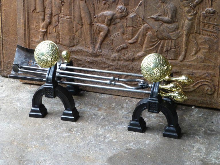 Late 19th or early 20th century English Art Nouveau fireplace toolset. Polished steel and brass fire tools with tool set cast iron and polished brass rests. The condition is good







 