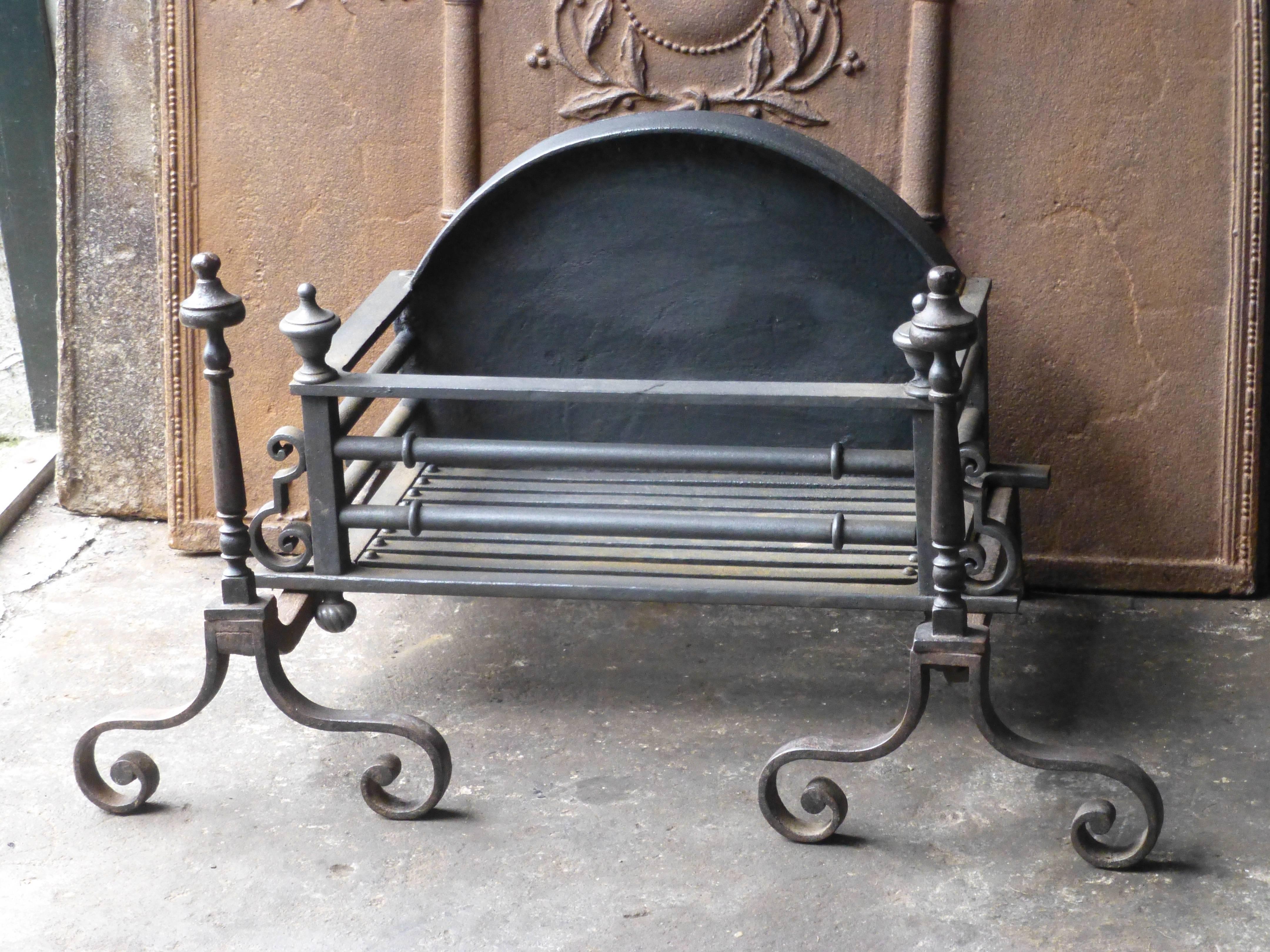 Rare Georgian, hand-forged fireplace basket or fire basket.

Total width at front is 81 cm.

We have a unique and specialized collection of antique and used fireplace accessories consisting of more than 1000 listings at 1stdibs. Amongst others we