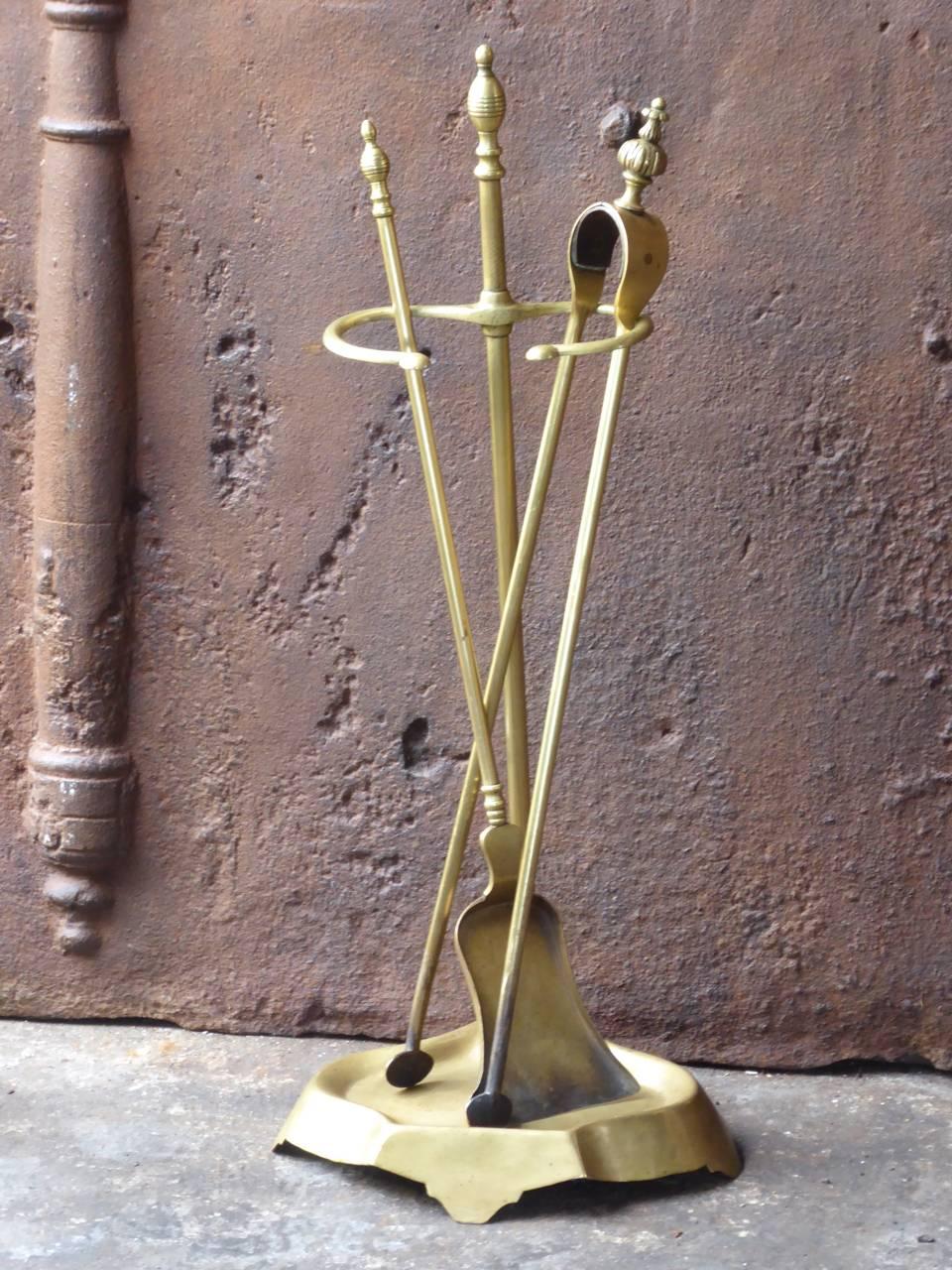 19th century French fireplace tool set - fire irons made of brass and copper. Bouhon Frères were prominent French producers of fireplace tools in the 19th century. The firm participated in the 1878 and 1900 Paris Expositions Universelles.

We have a