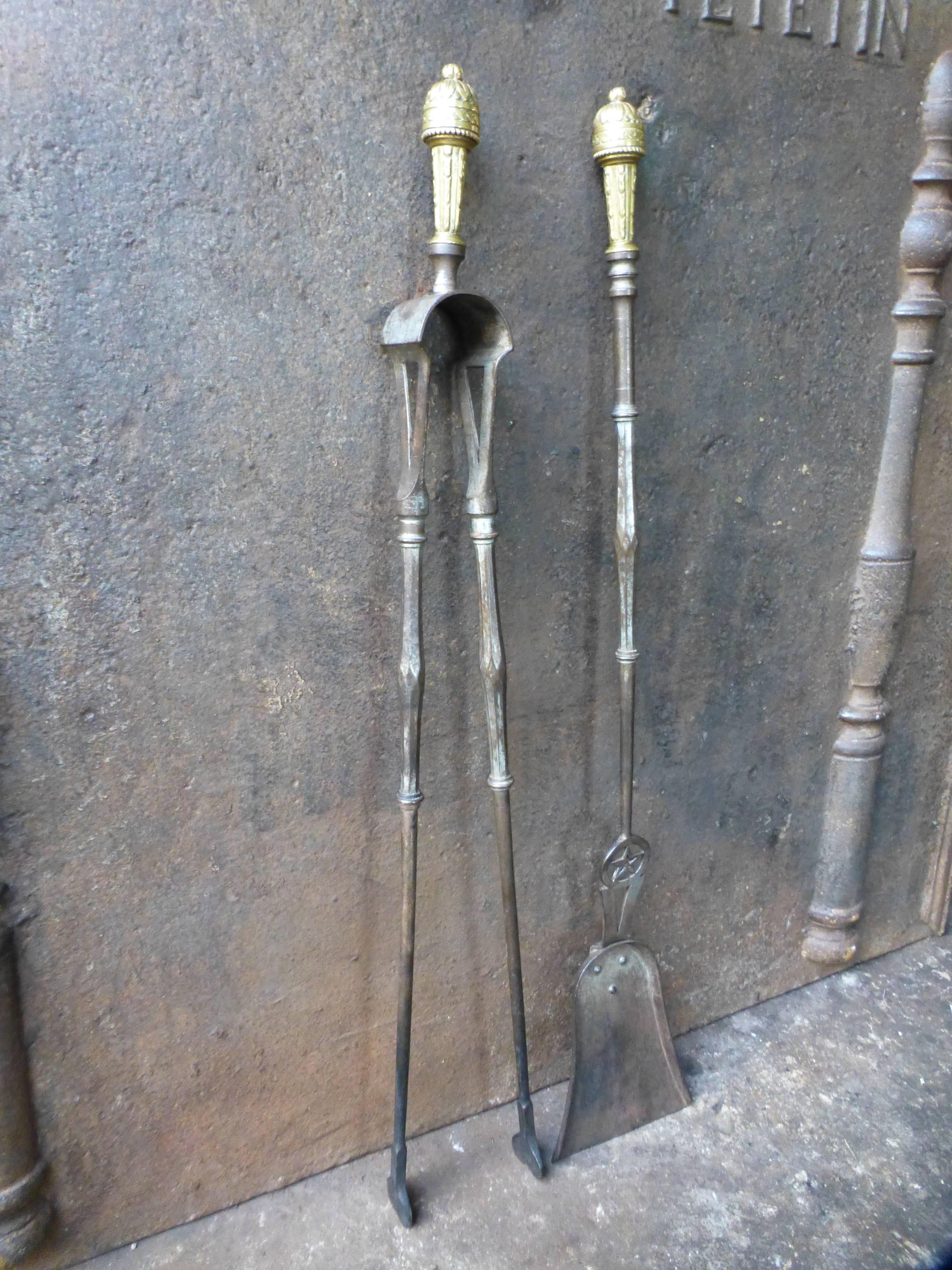 Rare set of French fire tools or fire irons.

We have a unique and specialized collection of antique and used fireplace accessories consisting of more than 1000 listings at 1stdibs. Amongst others we always have 300+ firebacks, 250+ pairs of