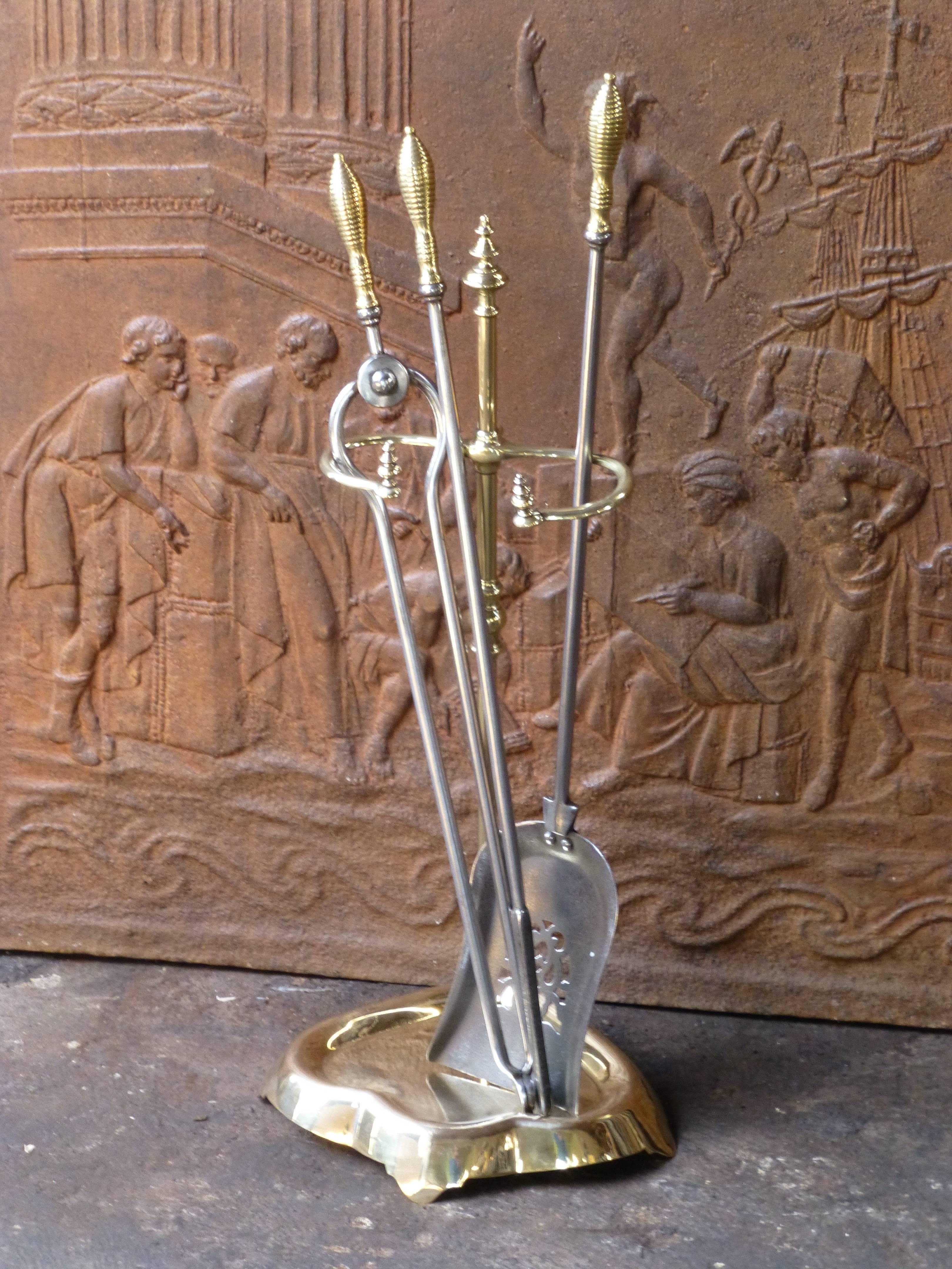 19th century polished brass and steel fire tool set and stand.

We have a unique and specialized collection of antique and used fireplace accessories consisting of more than 1000 listings at 1stdibs. Amongst others, we always have 500+ firebacks,