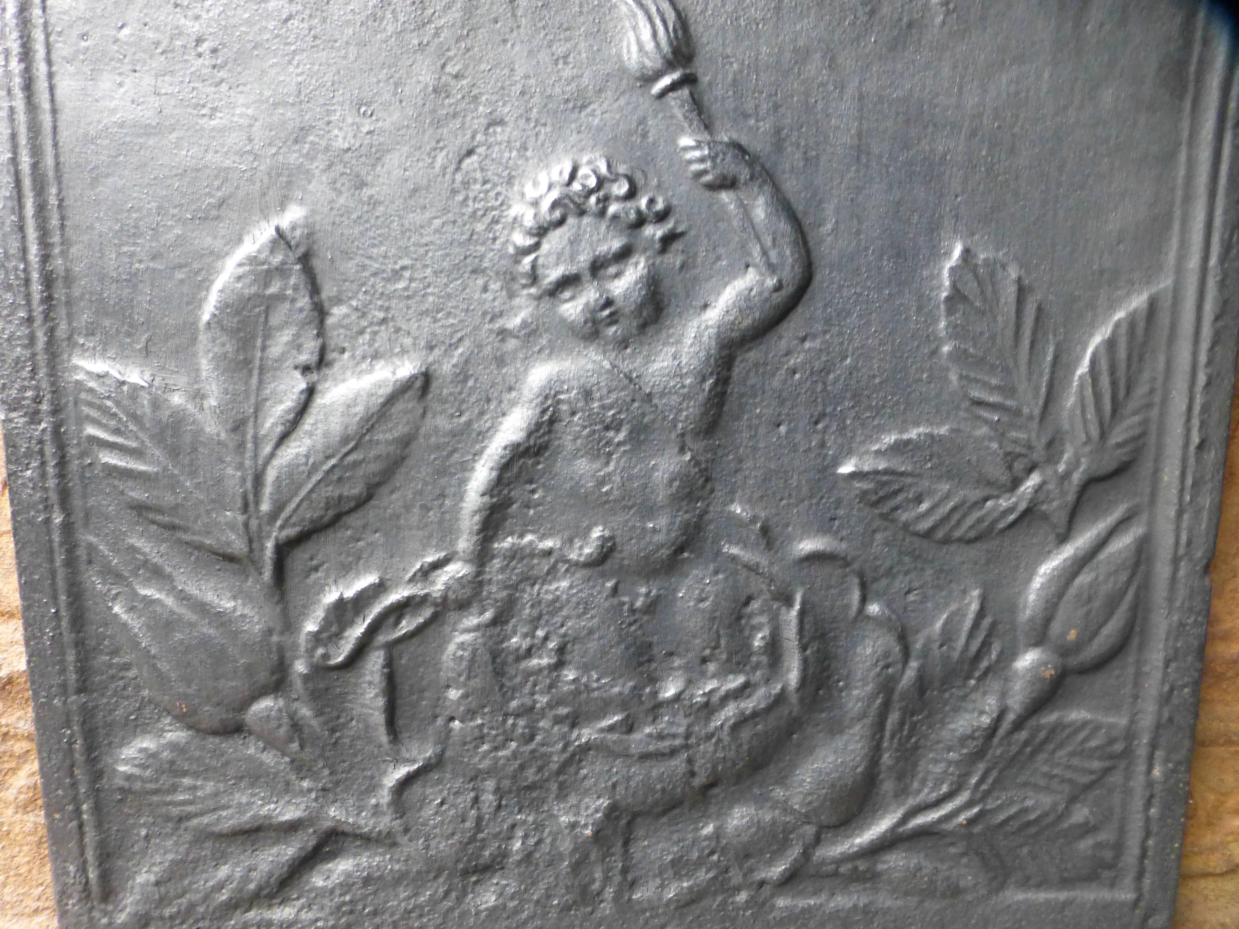 19th century French fireback picturing a cupid.

 