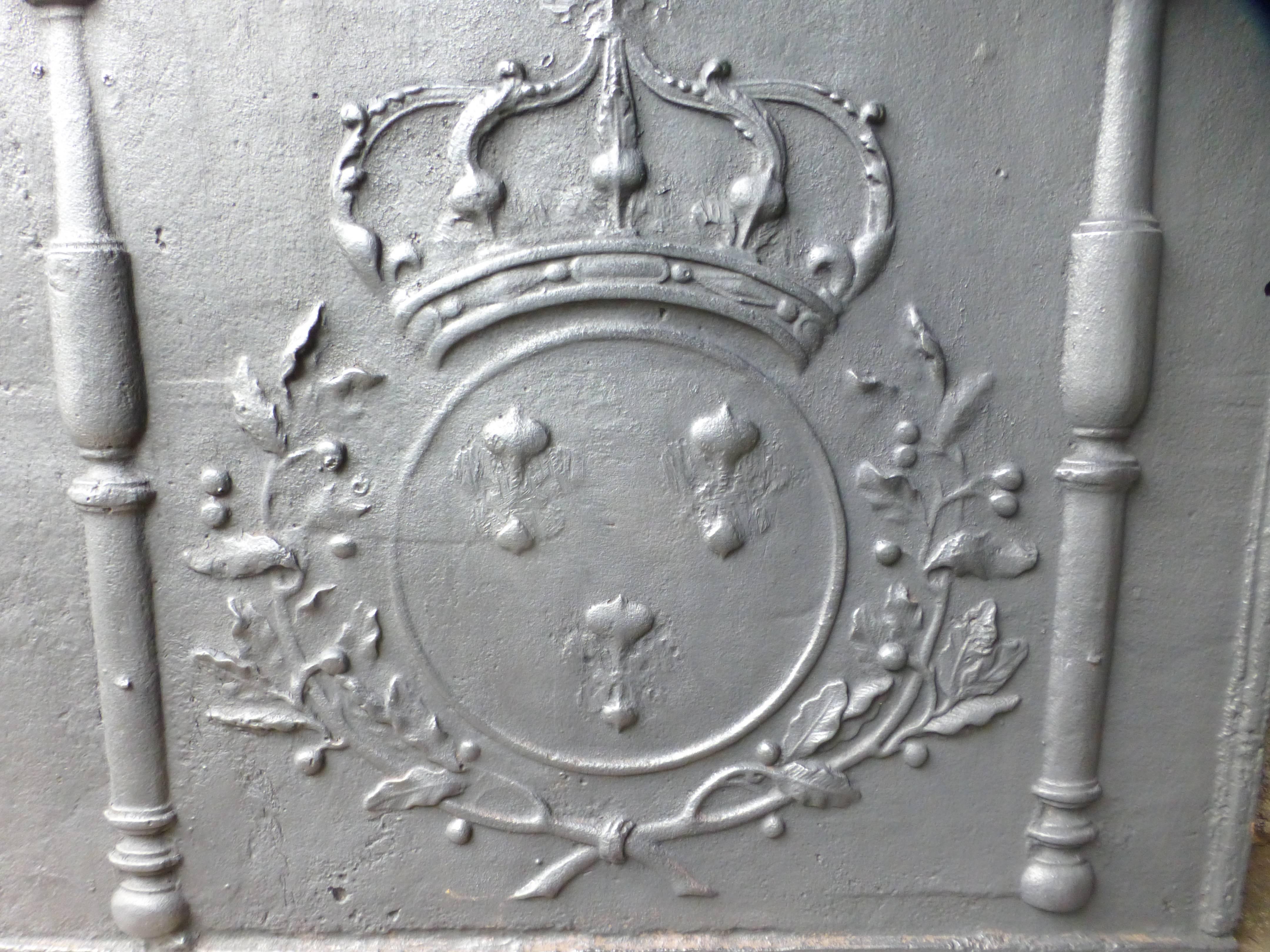 18th century French fireback with arms of France and date 1744. The arms of France are partly truncated during the French Revolution so that it wouldn't show any feudal or royal symbols anymore.

We have a unique and specialized collection of