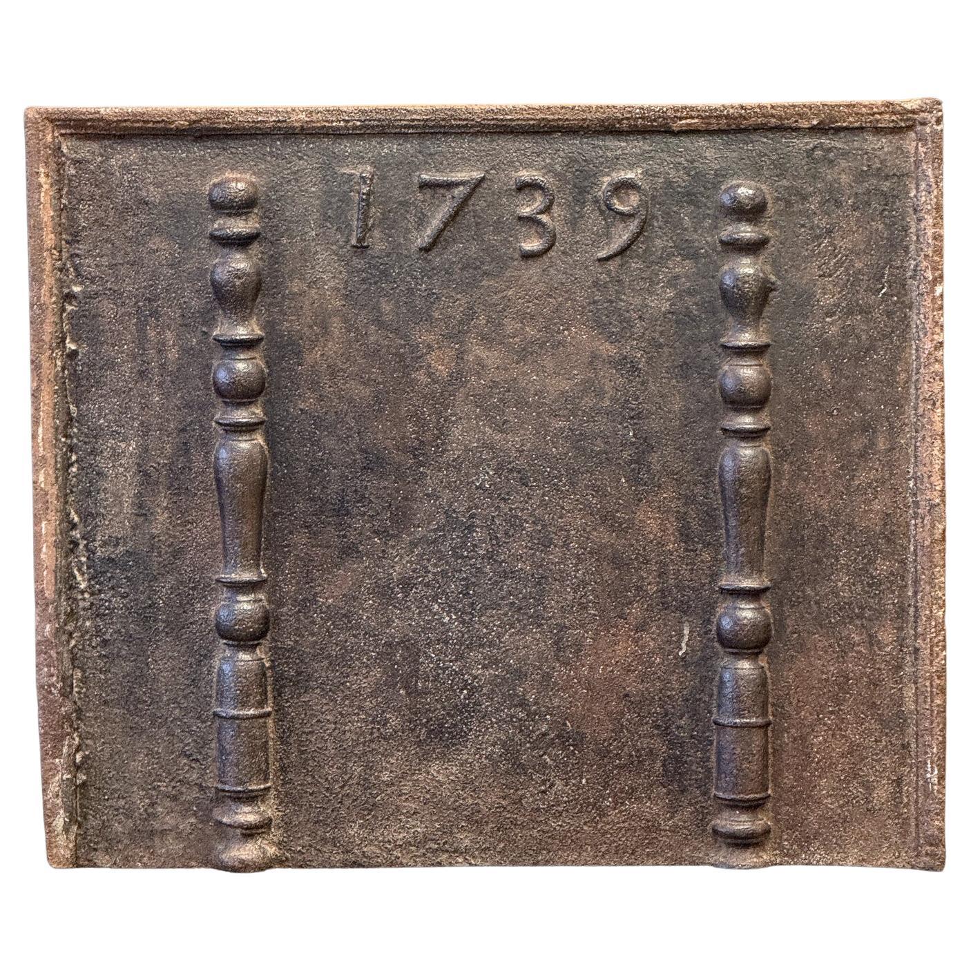 Plaque de cheminée / dosseret d'époque Louis XV, daté de 1739