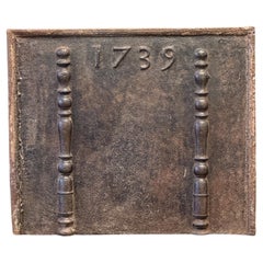 Plaque de cheminée / dosseret d'époque Louis XV, daté de 1739