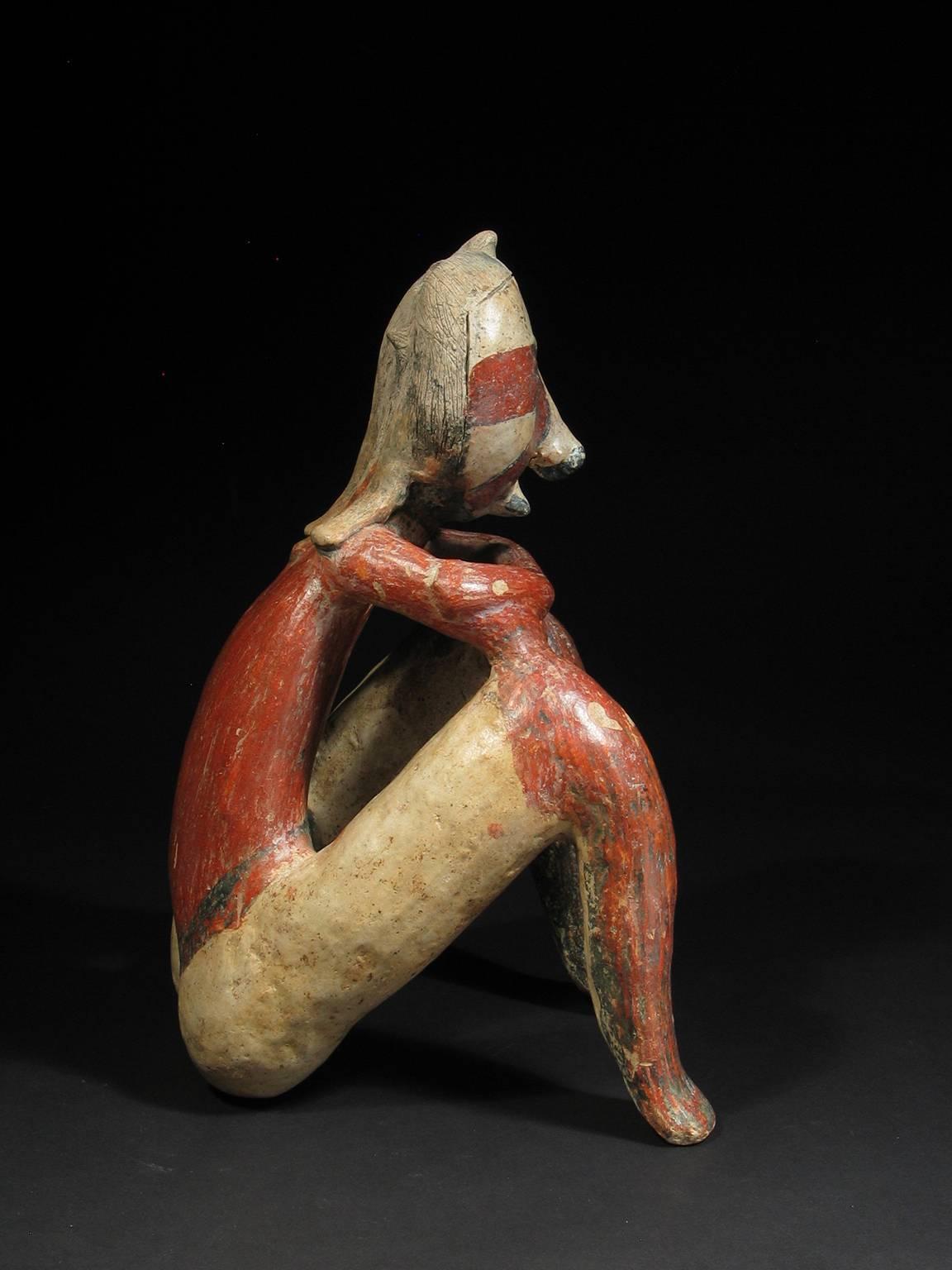 This charming seated Chinesco figure comes from Mexican state of Nayarit.  