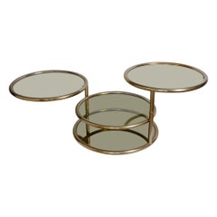 Milo Baughman Style Four-Tier Brass and Smoked Glass Swivel Accent Table