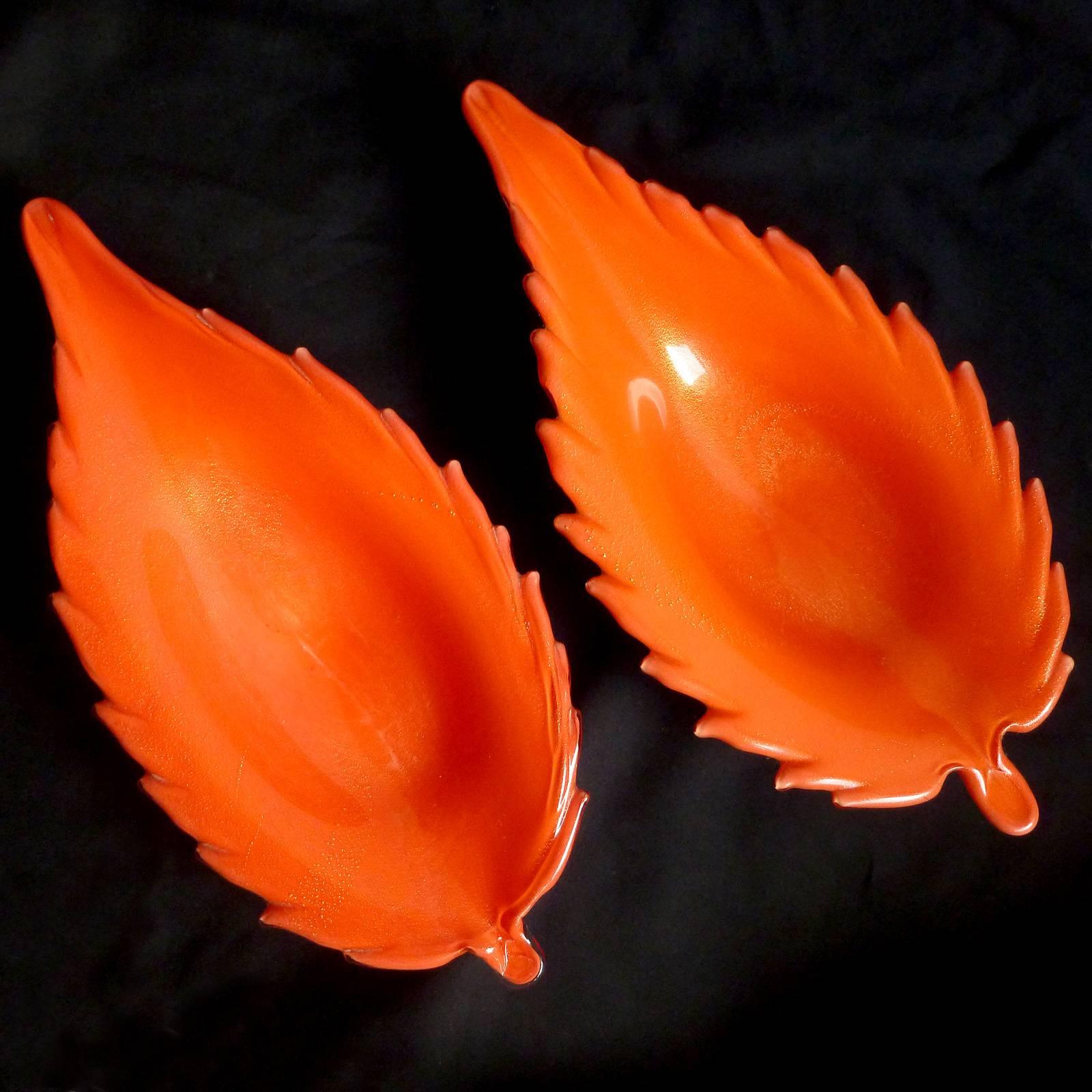 Price is per item - Gorgeous Murano hand blown feather or leaf shaped Italian art glass decorative serving bowls. Documented to designer Alfredo Barbini, circa 1950s-1960s. The 1st bowl has a striped design in copper aventurine along with gold.