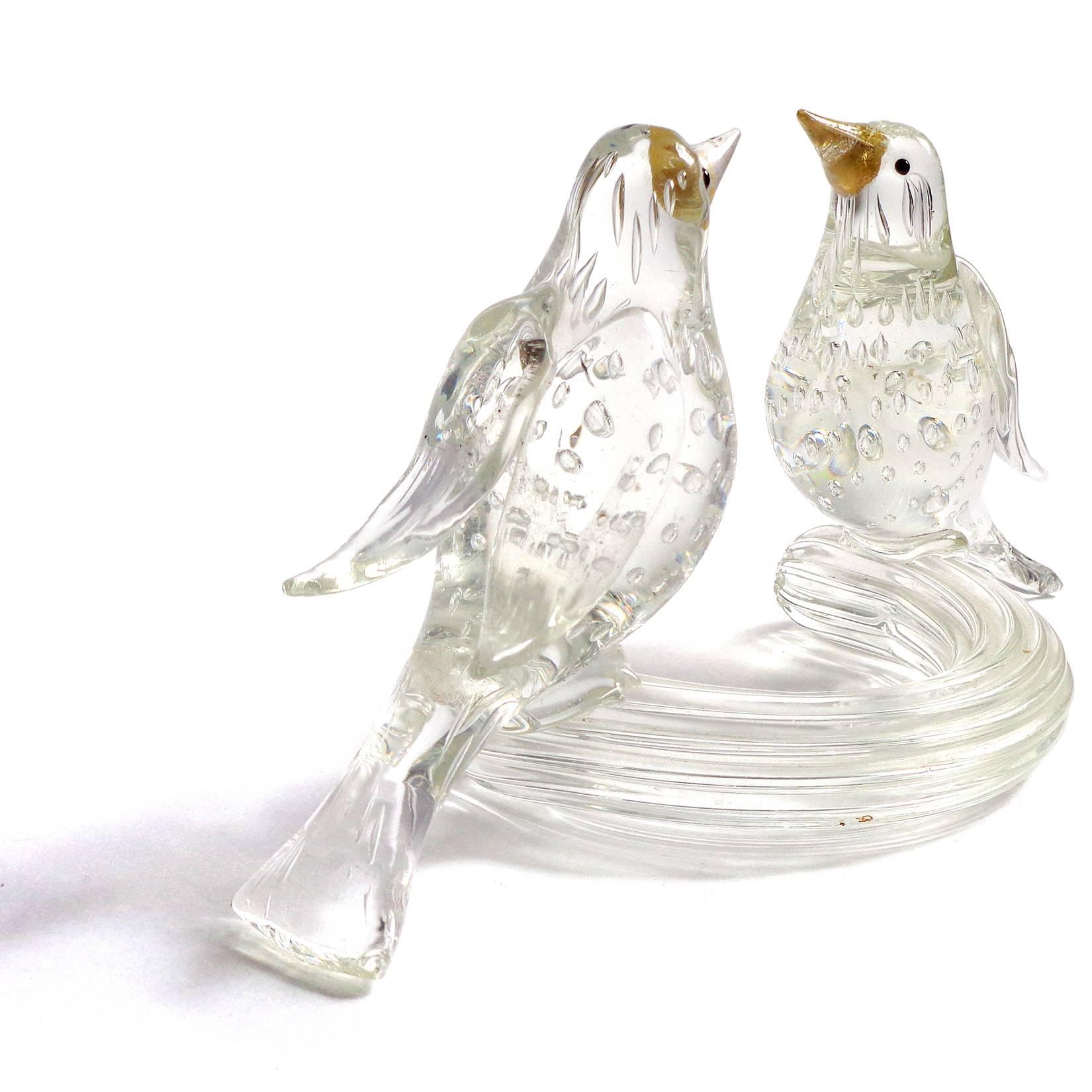Free shipping worldwide! See details below description.

Beautiful Murano crystal clear, bubbles and gold flecks art glass birds sculpture. Attributed to the Barovier e Toso company. Sweet pair of finches sitting on a clear base, with gold leaf on
