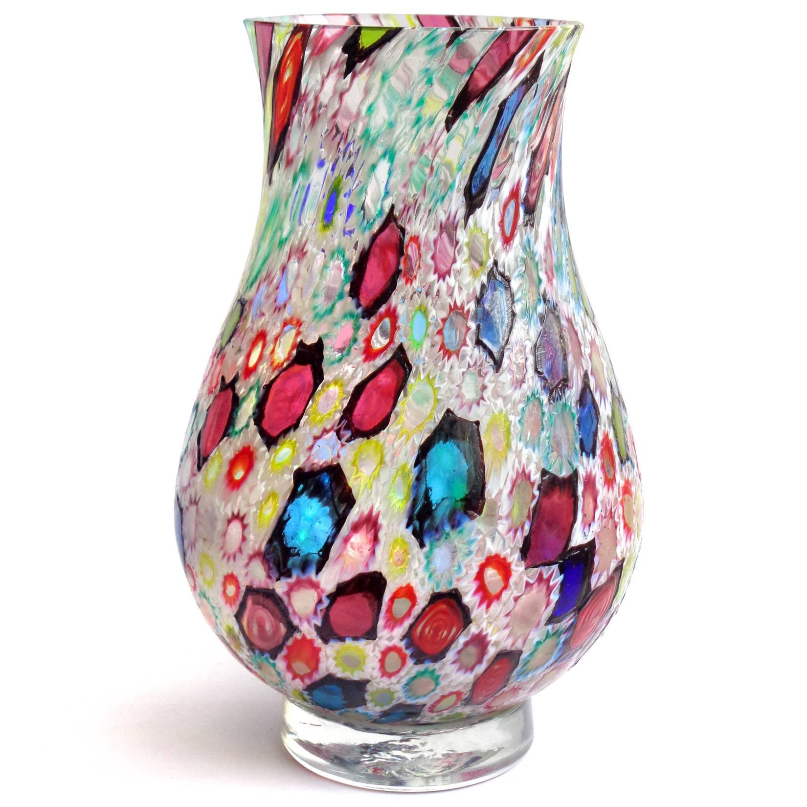 Free shipping worldwide! See details below description.

Incredible Murano multicolor Millefiori flower and star mosaic art glass large flower vase. Documented to the Fratelli Toso company. Many of the murrines are lined in white, but some are