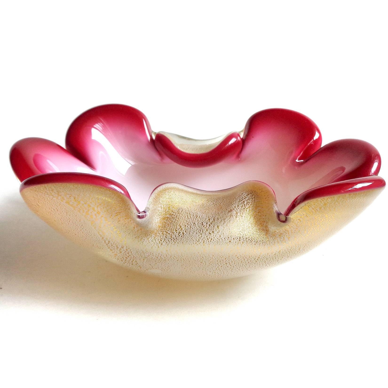 Free shipping worldwide! See details below description.

Beautiful Murano hand blown red rim, white and gold flecks art glass bowl. Documented to designer Archimede Seguso. The piece is profusely covered in gold leaf, with petals as the rim.