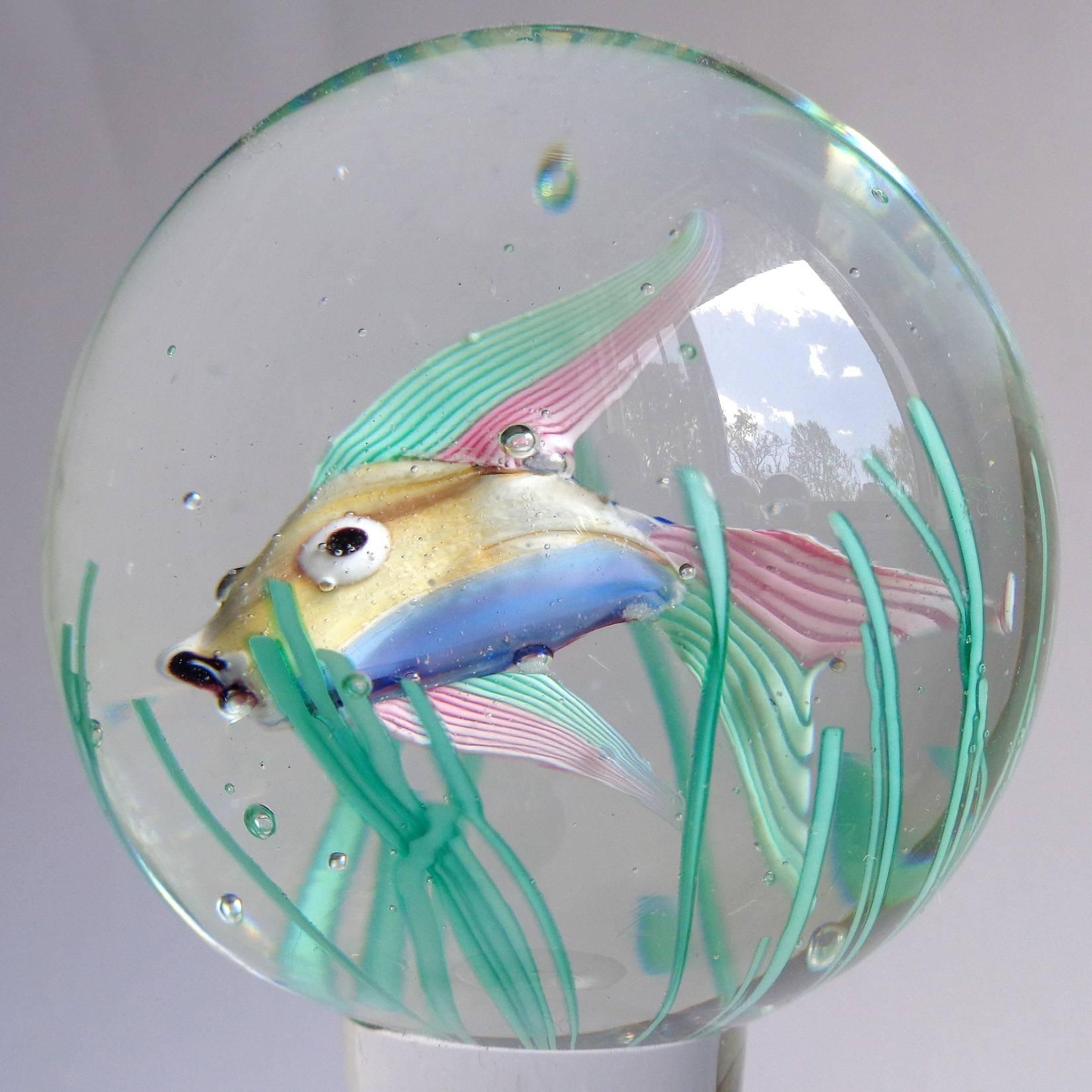 Beautiful set of 3 Murano hand blown 2 sided fish and algae Italian art glass aquarium paperweights. Documented to the Fratelli Toso company, one still retains the original label. Each of the fish has a different look when turned around. Pedestal