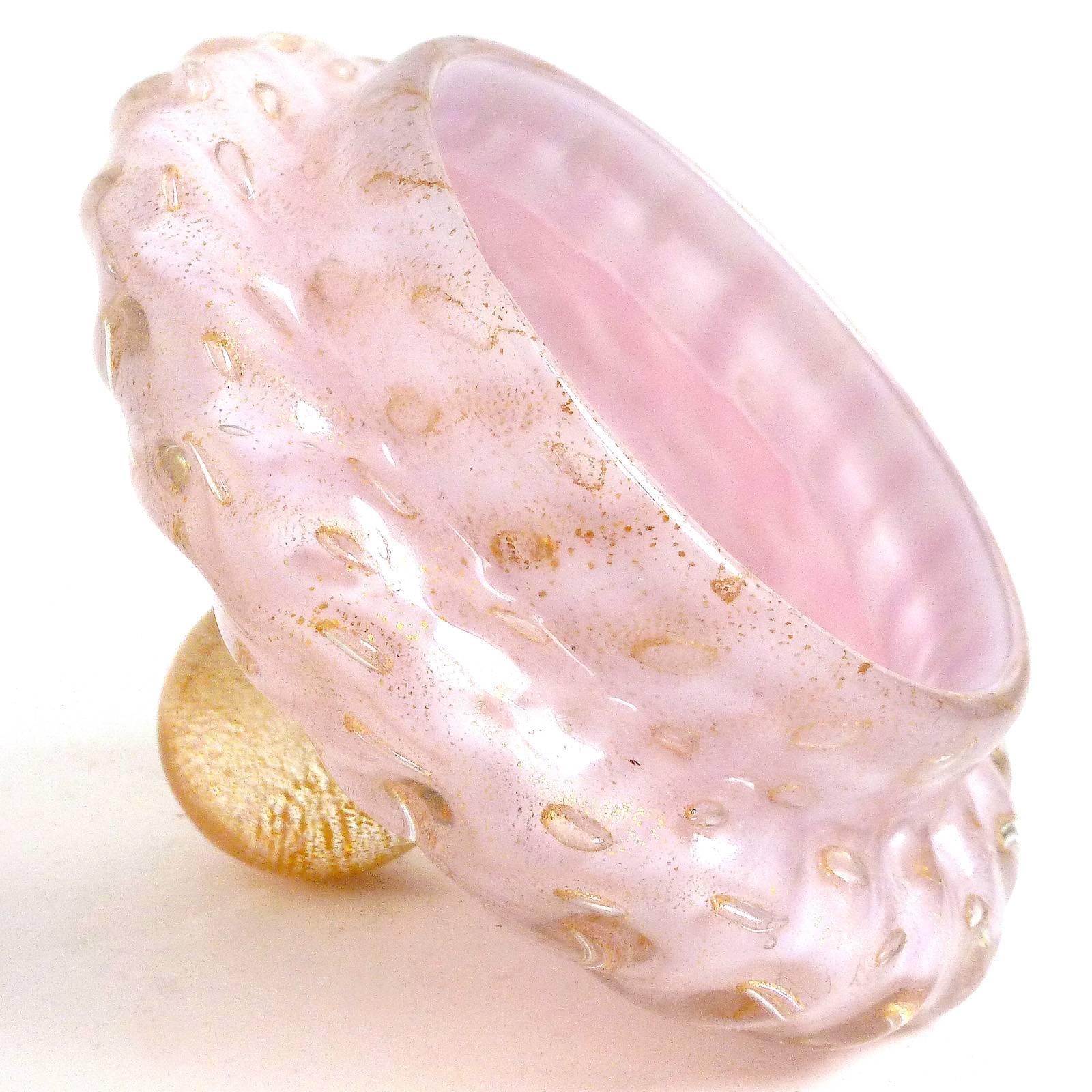 Free shipping worldwide! See details below description.

Beautiful and large Murano handblown pink, gold flecks and controlled bubbles art glass ribbed vanity powder box. Documented to designer Alfredo Barbini, circa 1950s. The piece has a ribbed
