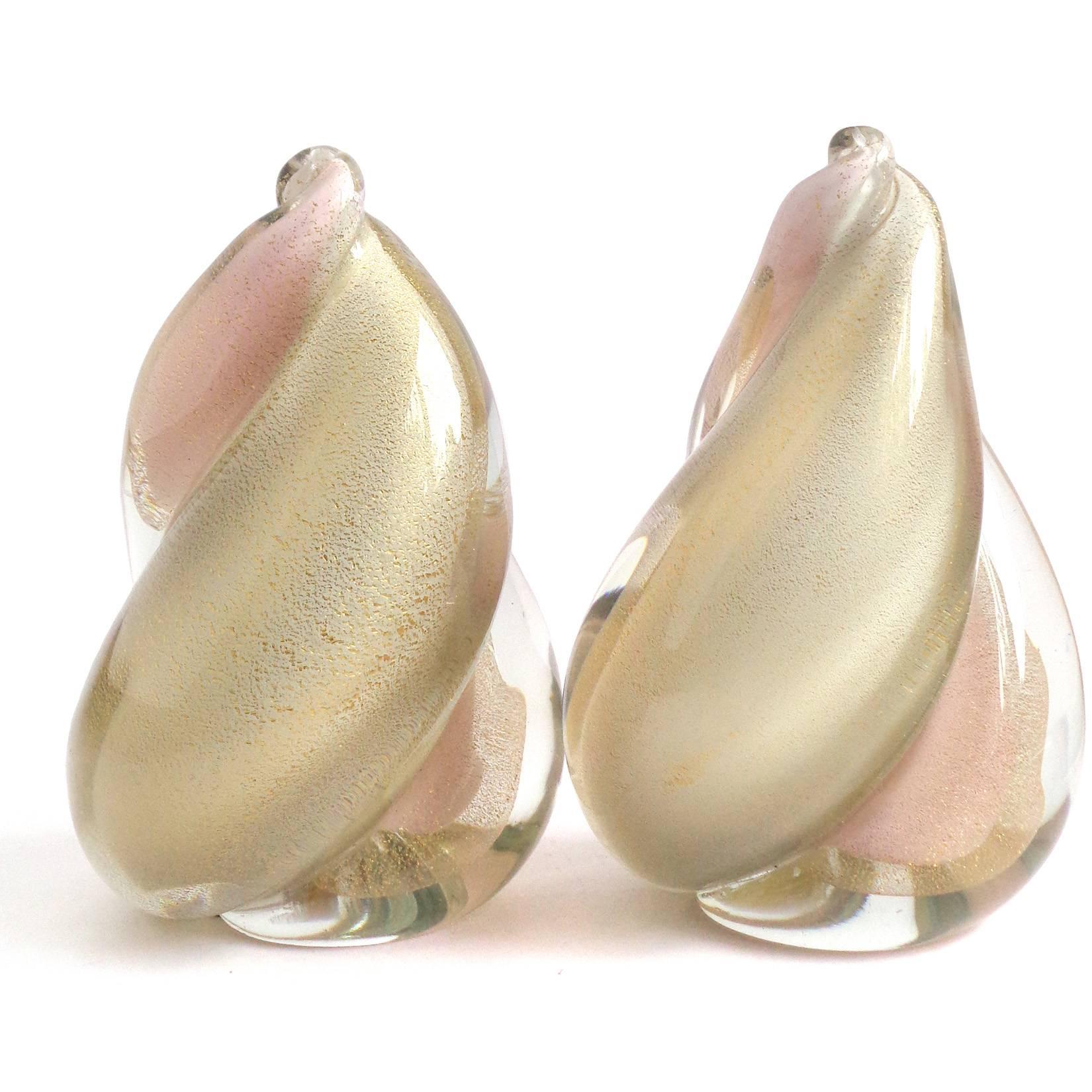 Gorgeous set Murano hand blown pink, white and gold flecks Italian art glass twisting flame bookends. Documented to designer Alfredo Barbini, circa 1950s and published in his catalog. Rare solid and double color design. Great for any desk or book