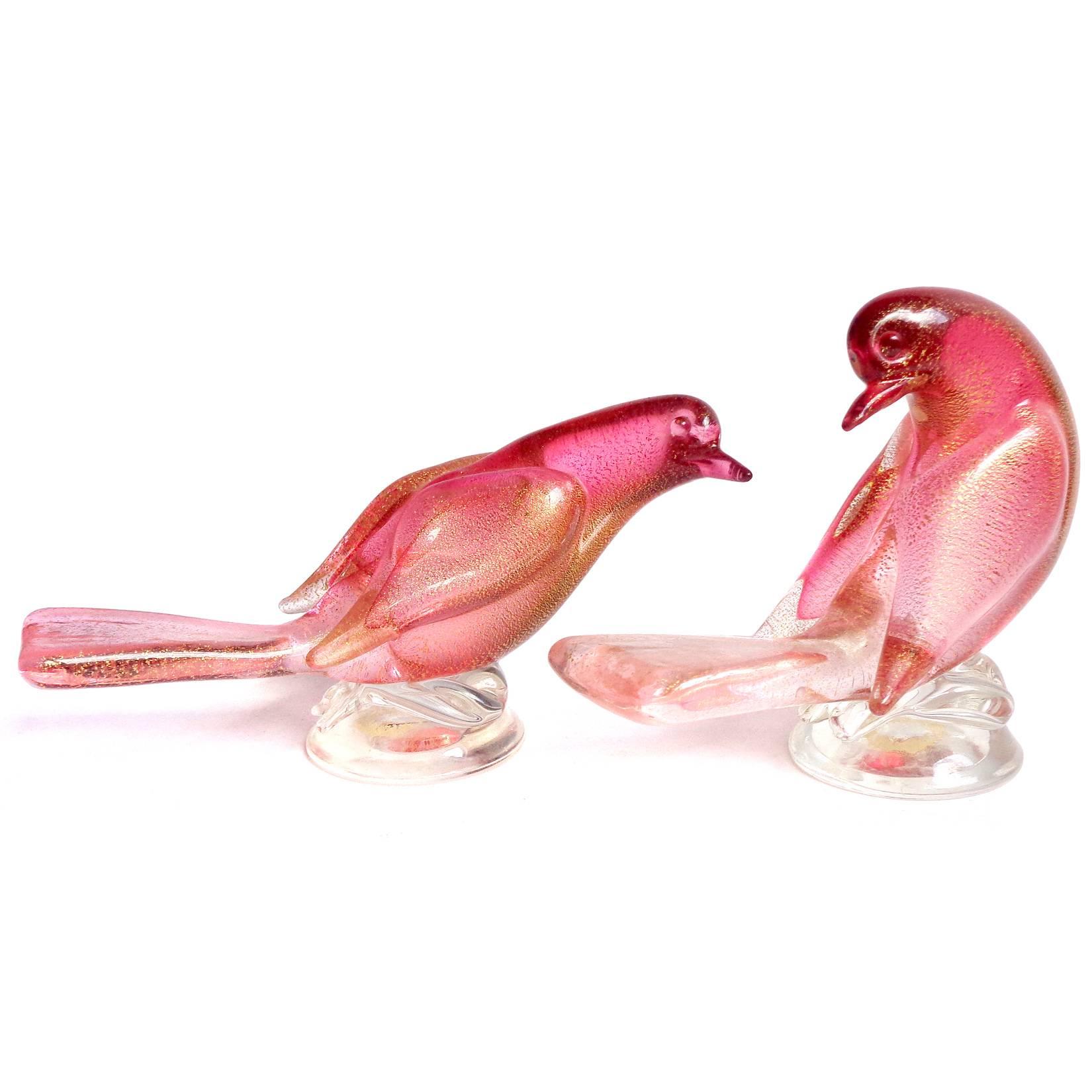 Free shipping worldwide! See details below description.

Beautiful set of Murano hand blown pink and gold flecks art glass dove bird sculptures / figurines. Documented to designer Archimede Seguso, with original labels underneath. They measure 6