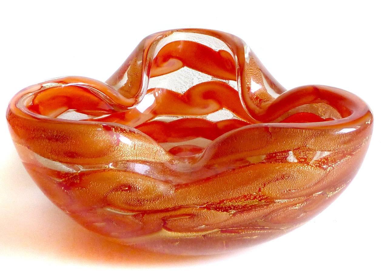 Free shipping worldwide! See details below description.

Beautiful Murano handblown gold flecks and rich orange red cloud design art glass bowl. Documented to designer Ercole Barovier for the Barovier e Toso company. This particular design has