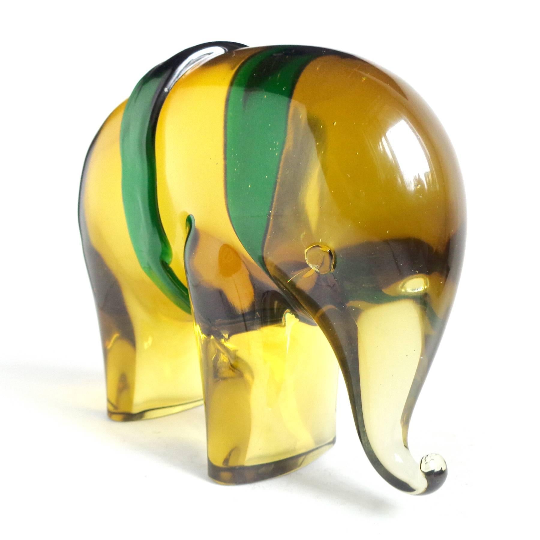 Free shipping worldwide! See details below description.

Elephant - Large Murano hand blown golden amber Sommerso art glass elephant sculpture. Documented to designer Luciano Gaspari for the Salviati company. The cute (and very heavy) elephant has