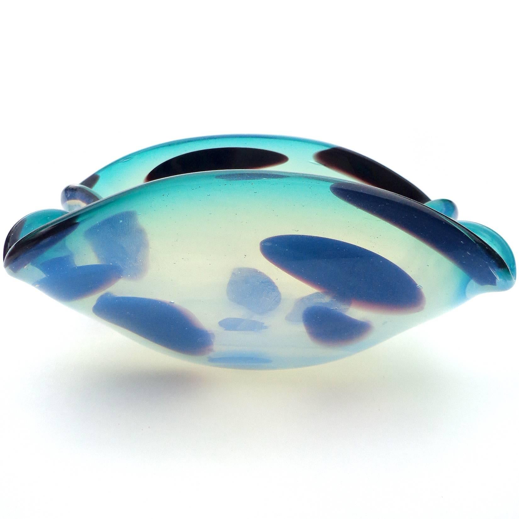 Free shipping worldwide! See details below description.

Beautiful Murano handblown opalescent blue with dark spots art glass decorative bowl. Created in the manner of the Cenedese company.

Please look at my exclusive 1stdibs Storefront page.