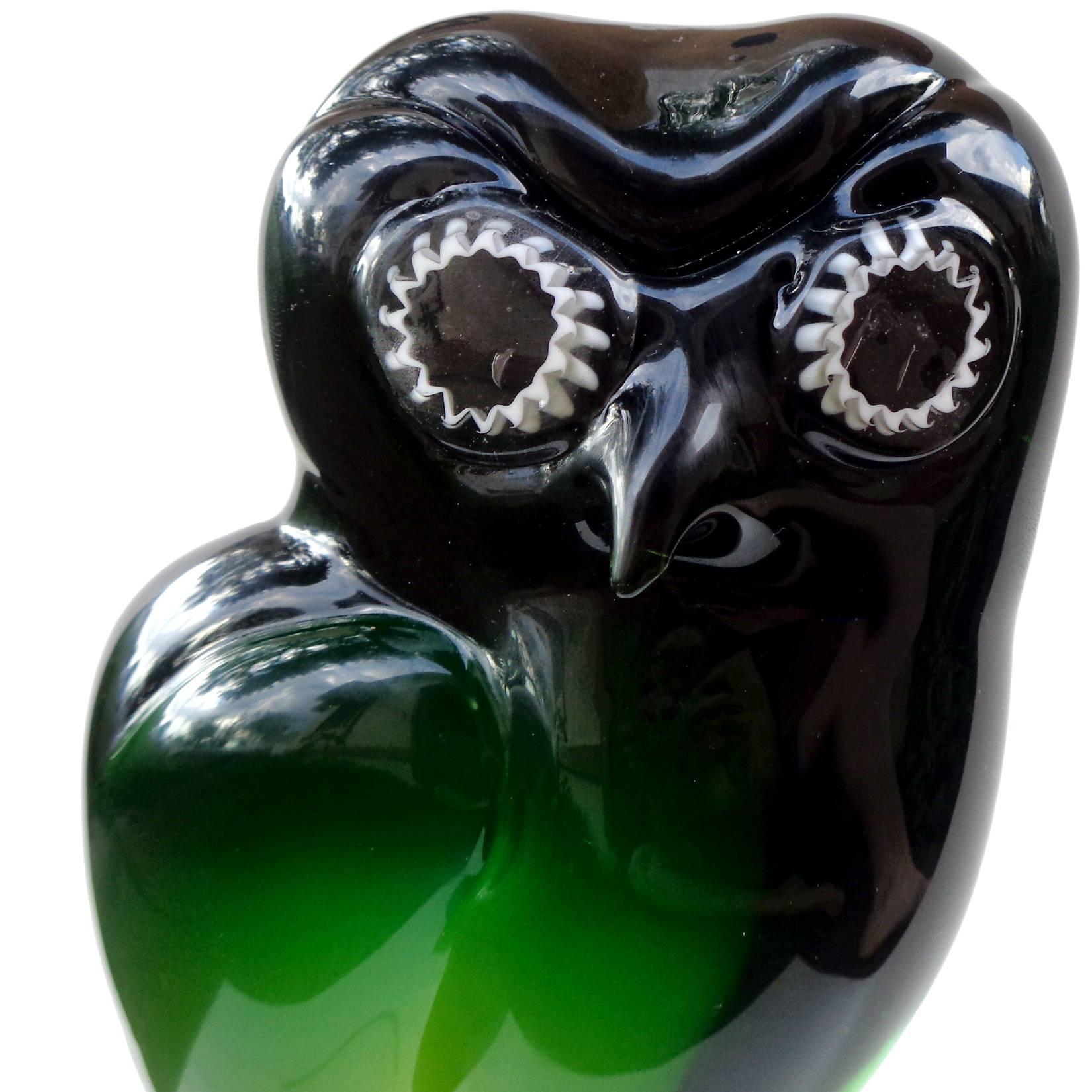 Free shipping worldwide! See details below description.

Beautiful Murano handblown Sommerso light to dark green art glass owl sculpture. Documented to the Salviati Company. It has white murrines for the eyes and stands on clear glass