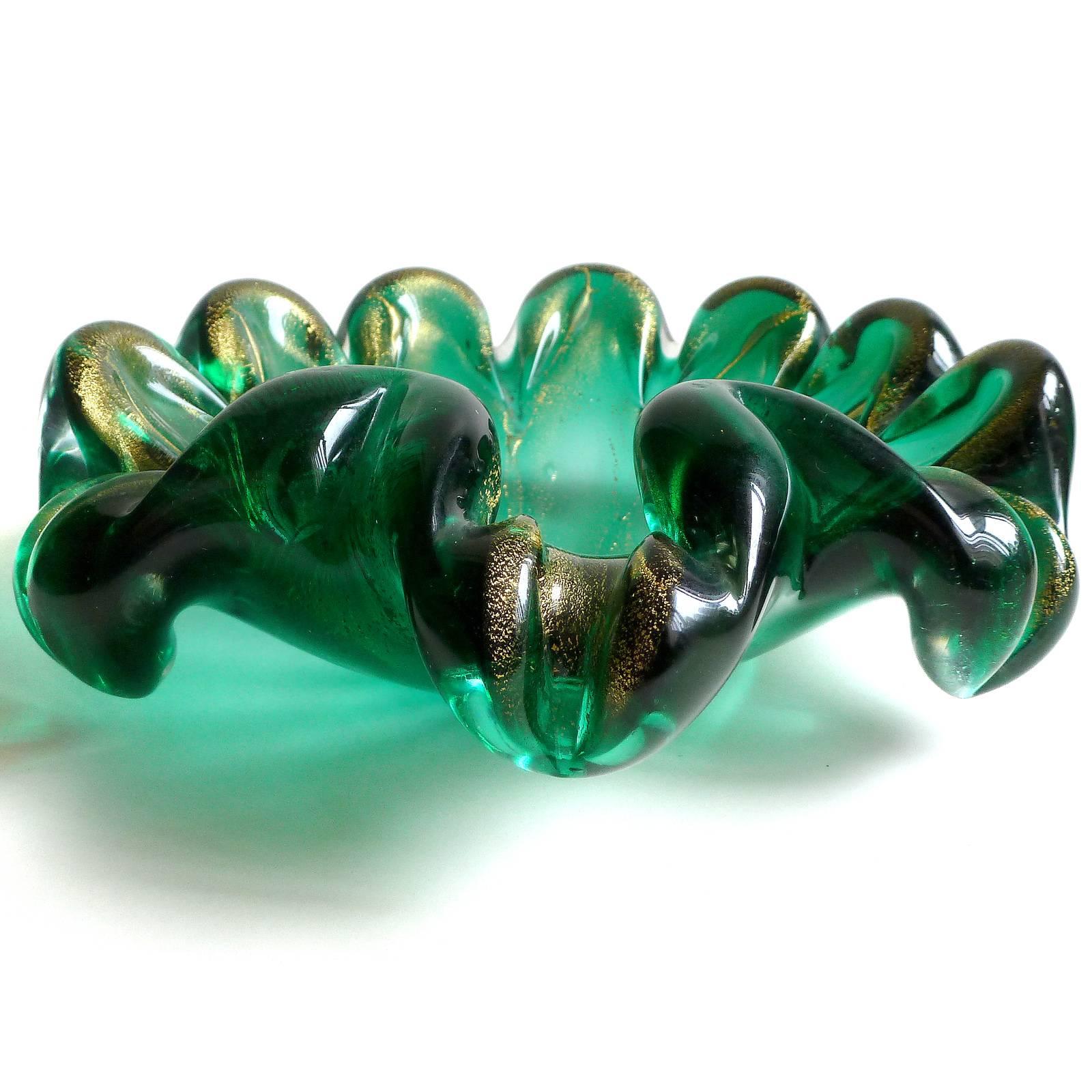 Free shipping worldwide! See details below description.

Gorgeous Murano handblown emerald green and gold flecks art glass ring bowls. Both pieces have a scalloped edge, one with a scroll decoration. They are both profusely covered in heavy gold