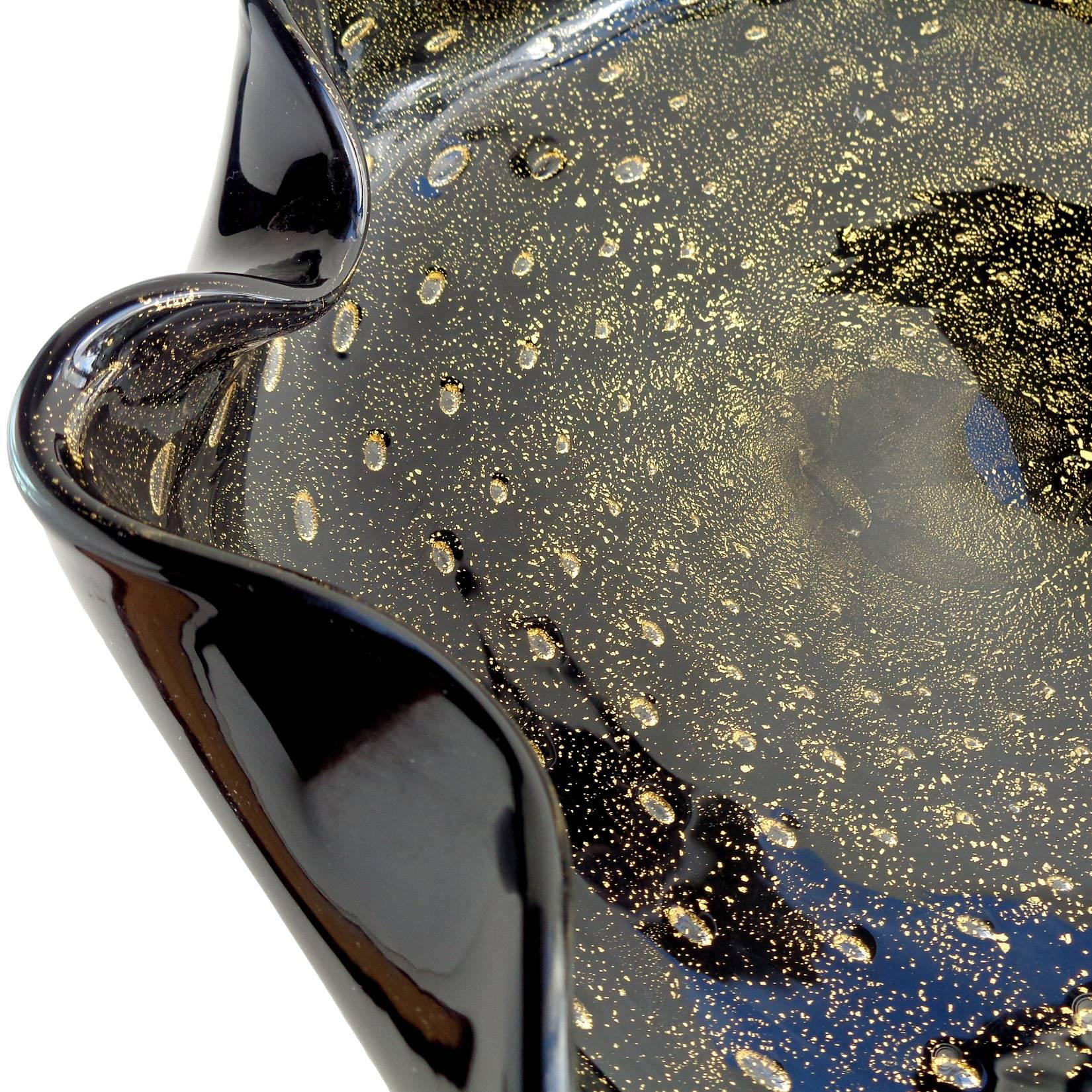 Free shipping worldwide! See details below description.

Gorgeous large Murano handblown black, controlled bubbles and gold flecks art glass centerpiece bowl. Documented to designer Alfredo Barbini and published in his catalog, circa 1950s-1960s.