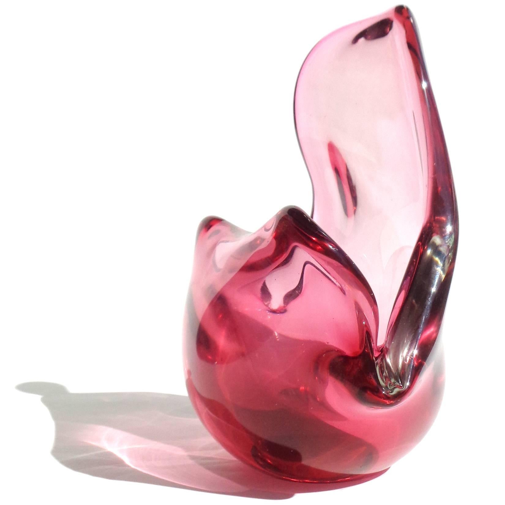 Elegant and large Murano hand blown pink Italian art glass conch seashell shape vase or sculpture. Documented to designer Flavio Poli for Seguso Vetri d'Arte. Published in the company's book, by Marc Heiremans, page 276, image 137. Last photo shows