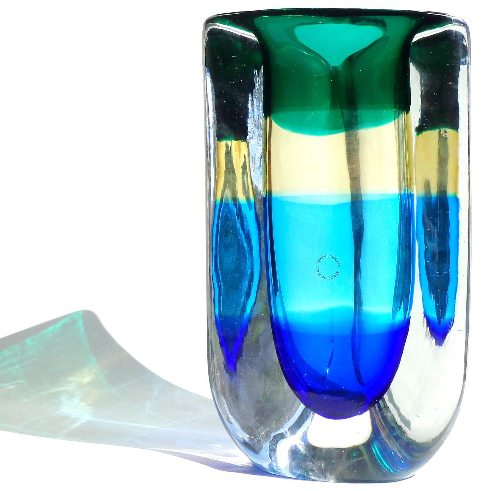 Amazing large Murano hand blown thick walled Sommerso green, yellow blue and cobalt Italian art glass flower vase. Documented to designer Fulvio Bianconi for Venini, circa 1992. Signed, dated and with a limited edition number. Also still retains