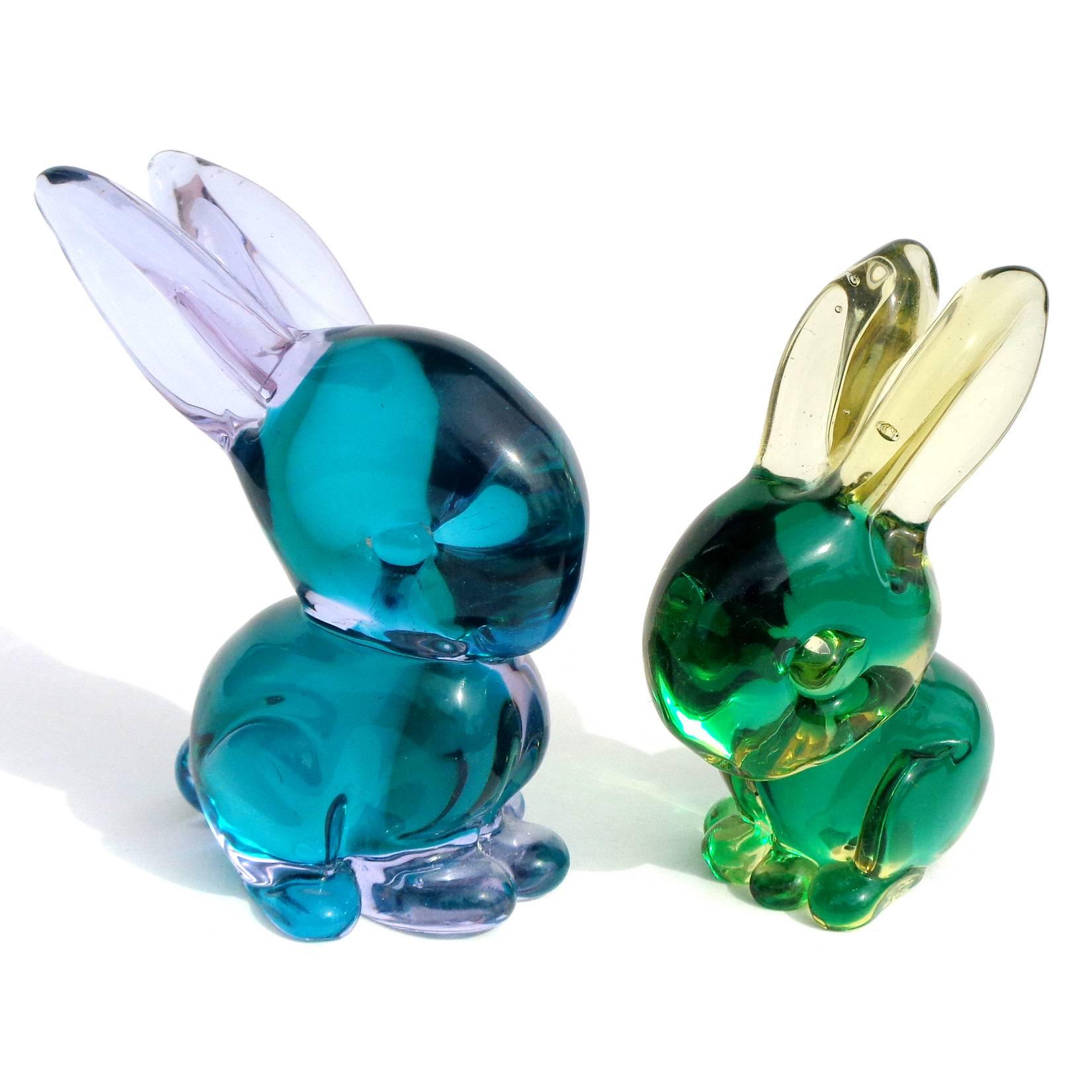 Free shipping worldwide! See details below description.

Adorable set of Murano handblown Sommerso blue Alexandrite over green, and yellow over green art glass bunny rabbit sculptures. Documented to designer Flavio Poli for the Seguso Vetri d'Arte