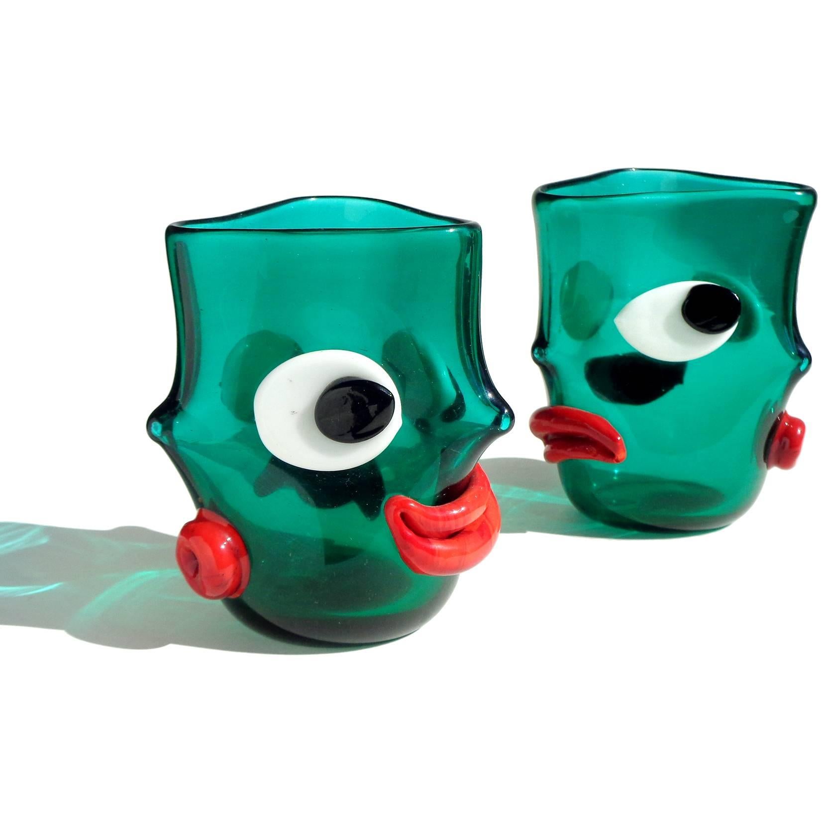 Free shipping worldwide! See details below description.

Rare pair of Murano handblown green with applied eyes and mouth art glass 