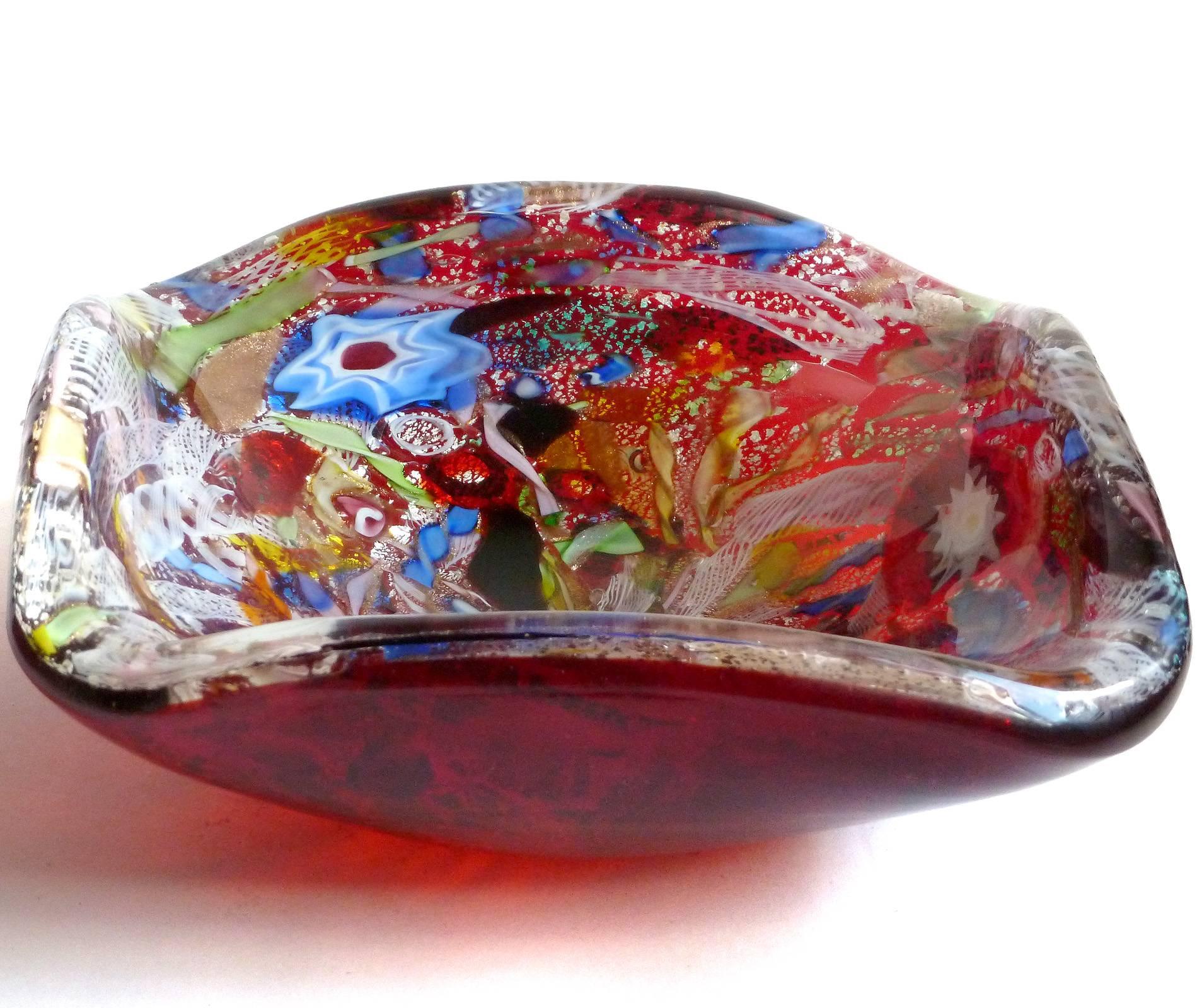 Free shipping worldwide! See details below description.

Large Murano handblown red over silver flecks, Millefiori flower canes, Zanfirico and Latticino ribbons art glass bowl. Documented to the Arte Vetreria Muranese (A.Ve.M.) company, and