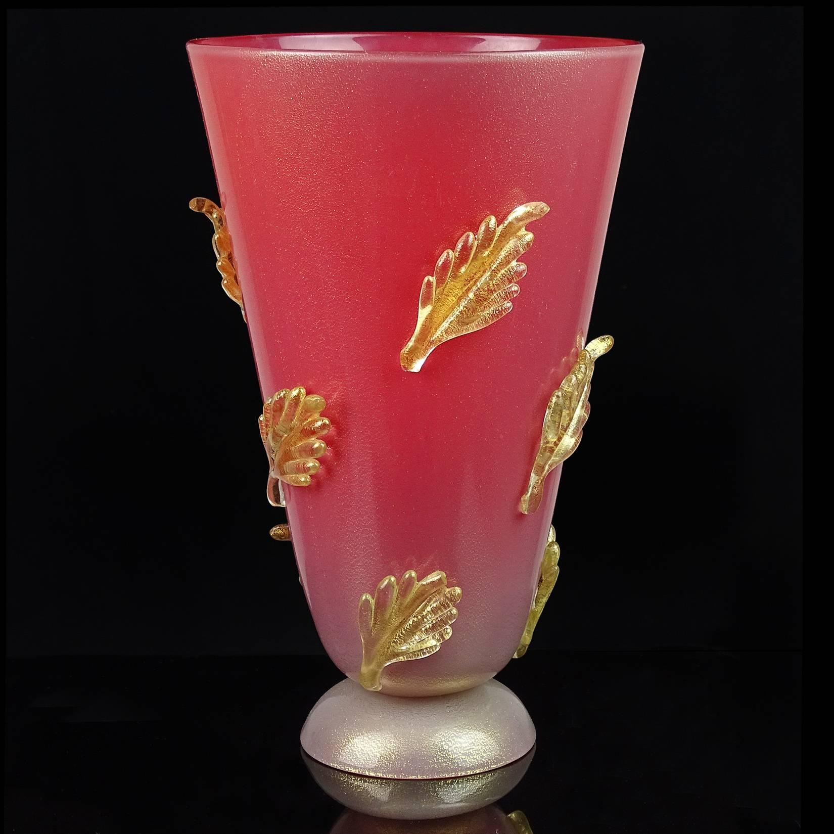 Very rare Murano hand blown gold flecks over red/pink, with applied gold leafs Italian art glass flower vase. Attributed to Barovier Seguso Ferro, circa 1930s-1940s. A similar vase is shown in the Seguso Vetri D' Arte book, page 134. Measures just