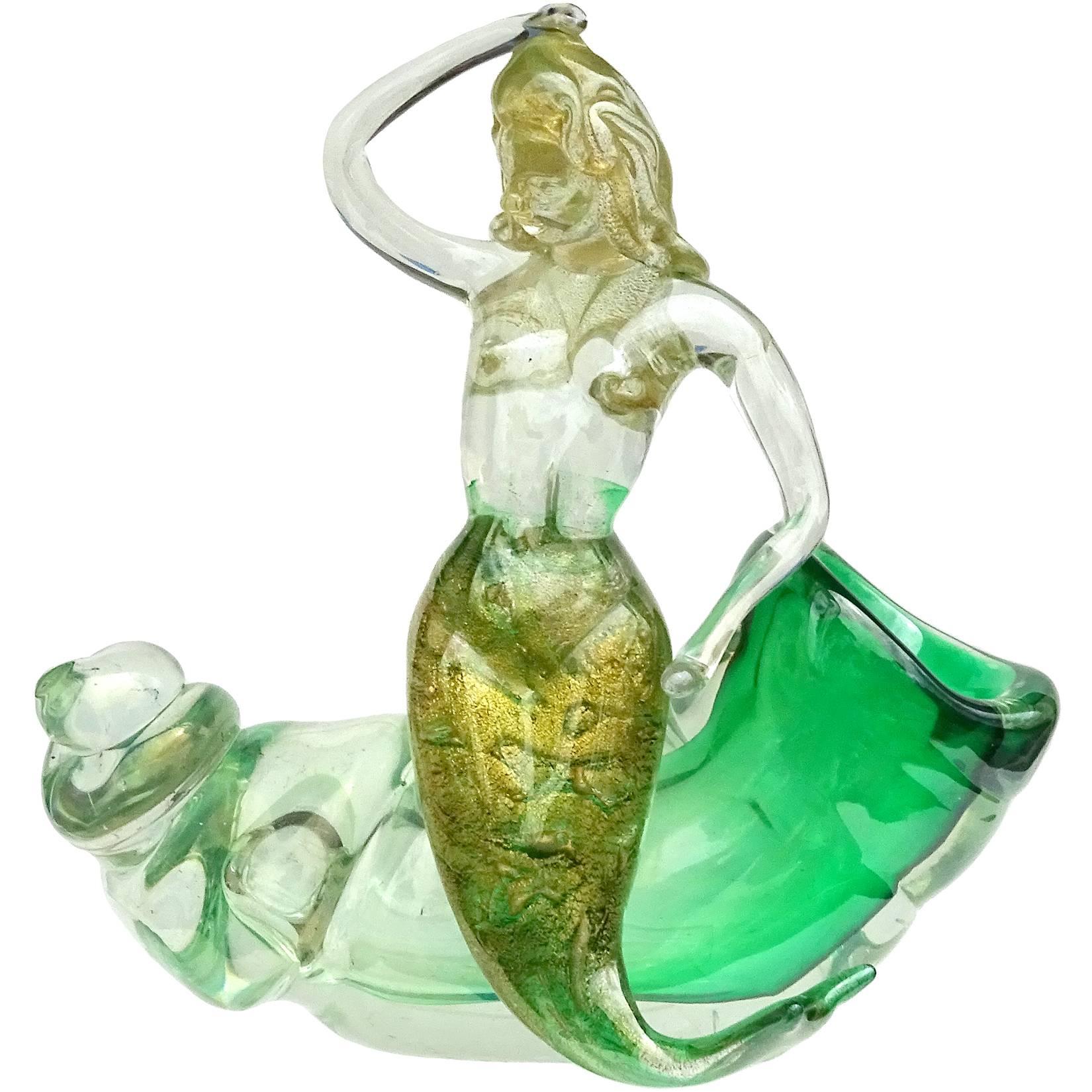 Free shipping worldwide! See details below description.

Rare, large and gorgeous Murano handblown, green with gold flecks and iridescent surface art glass mermaid figure on large seashell. Created in the manner of the Barovier e Toso and Seguso