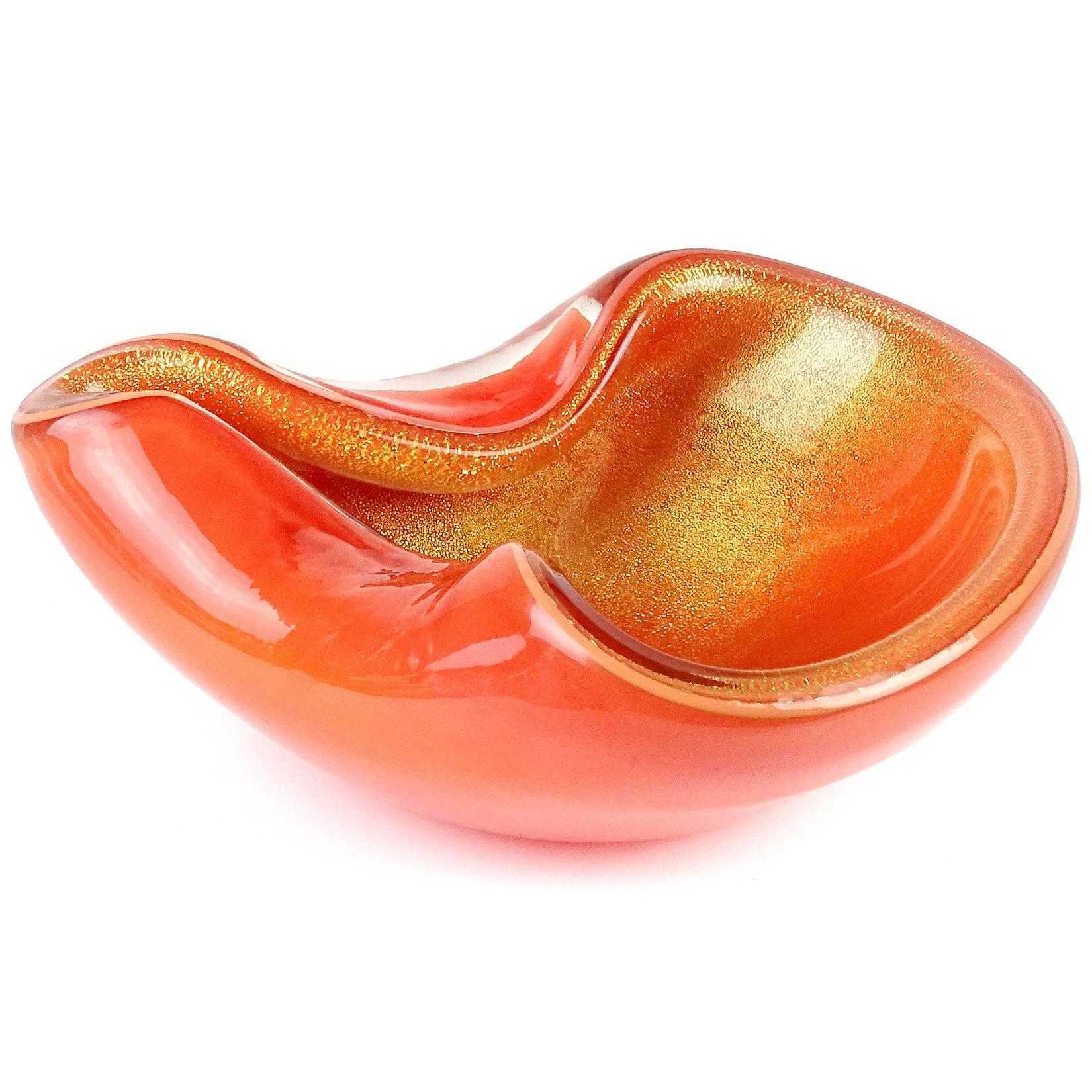 Free shipping worldwide! See details below description.

Beautiful folded rim Murano hand blown orange and gold flecks art glass bowl. Documented to designer Alfredo Barbini and published in his catalog, circa 1950s-1960s. Measures 6 1/2