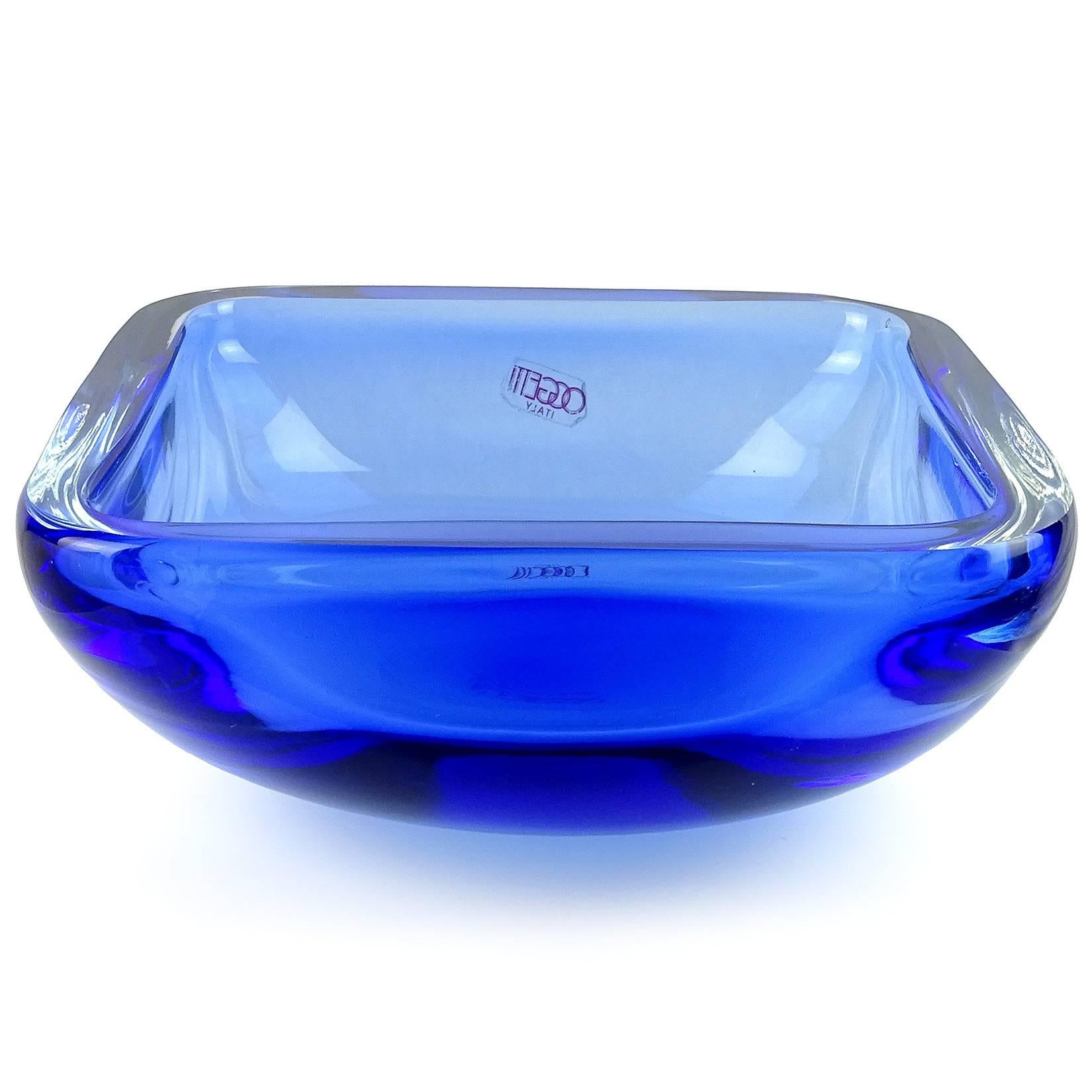 Free shipping worldwide! See details below description.

Gorgeous Murano handblown Sommerso cobalt blue art glass decorative bowl. Labelled “Oggetti Italy”, circa 1970s-1980s. The piece is very large measures at 8 1/4” squared.

Click under the