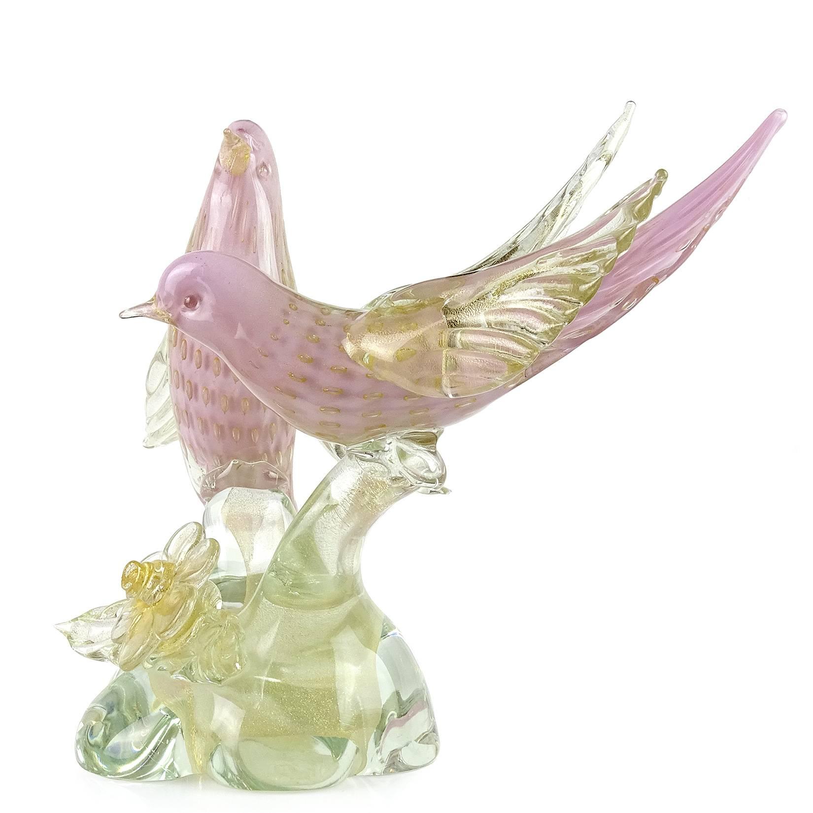 Beautiful large Murano handblown pink, controlled bubbles and gold flecks Italian art glass courting birds sculpture. Attributed to designer Alfredo Barbini, circa 1950s. The piece is very large, and profusely covered in gold leaf throughout the