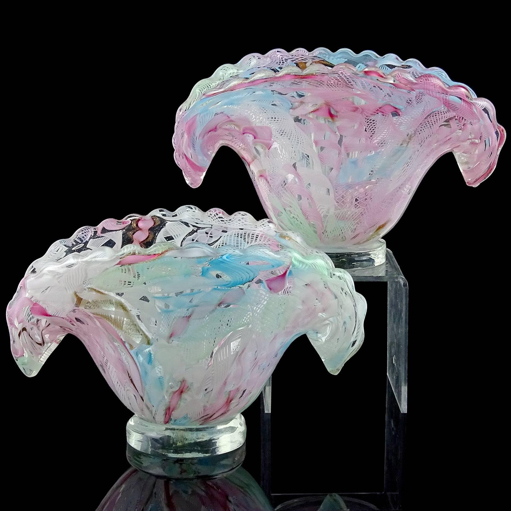 Beautiful pair of Murano handblown multi-color pastel ribbons Italian art glass open fan / clam shell shaped flower vase. Attributed to the Fratelli Toso company. They have white, green, blue, pink twisted Latticino and Zanfirico ribbons, some with