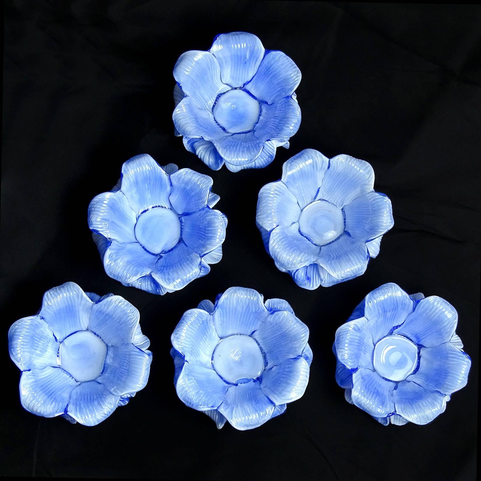Gorgeous set of Murano handblown, blue and white double petal Italian art glass flower bowls / candleholders. Attributed to the Fratelli Toso Company, circa 1950s, all with original labels underneath. They have a glass disk on the bottom, and