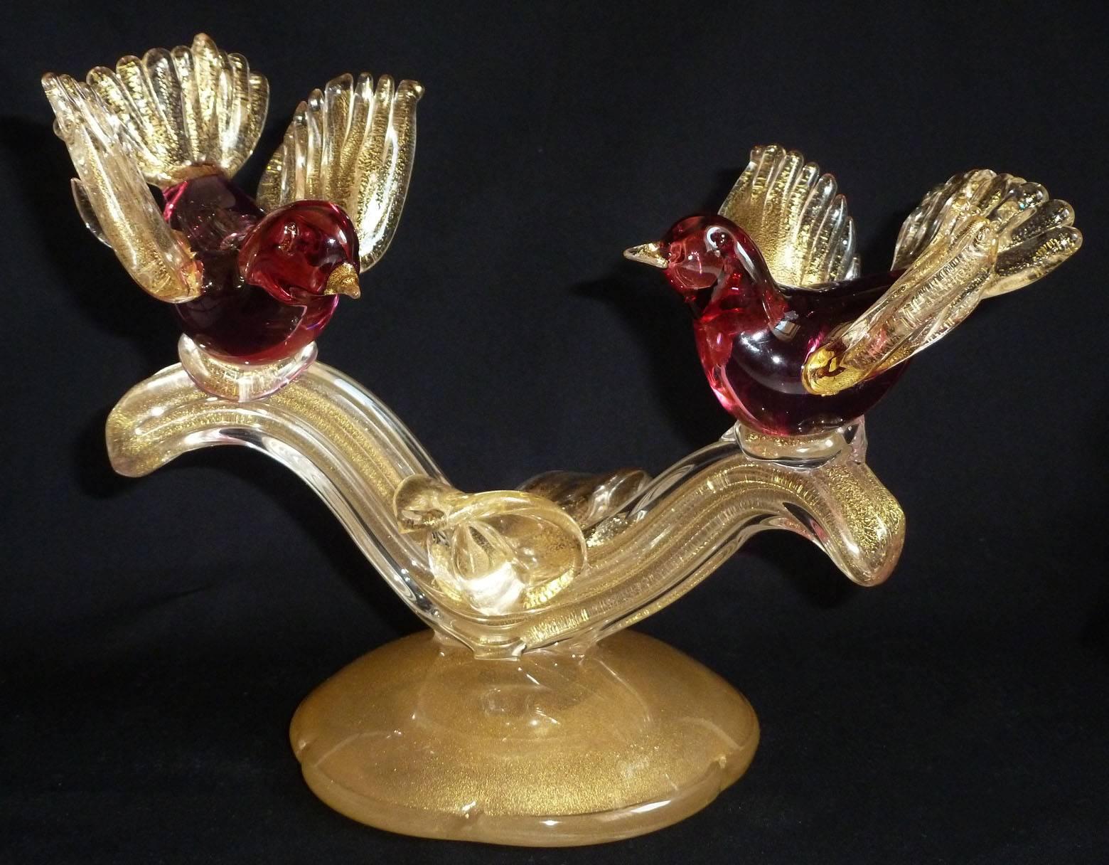 Beautiful Murano handblown cranberry pink and gold flecks Italian art glass birds on branch sculpture. Documented as a Alfredo Barbini piece, circa 1950s, and published in his Weil Ceramics and Glass catalog. Profusely covered in gold leaf