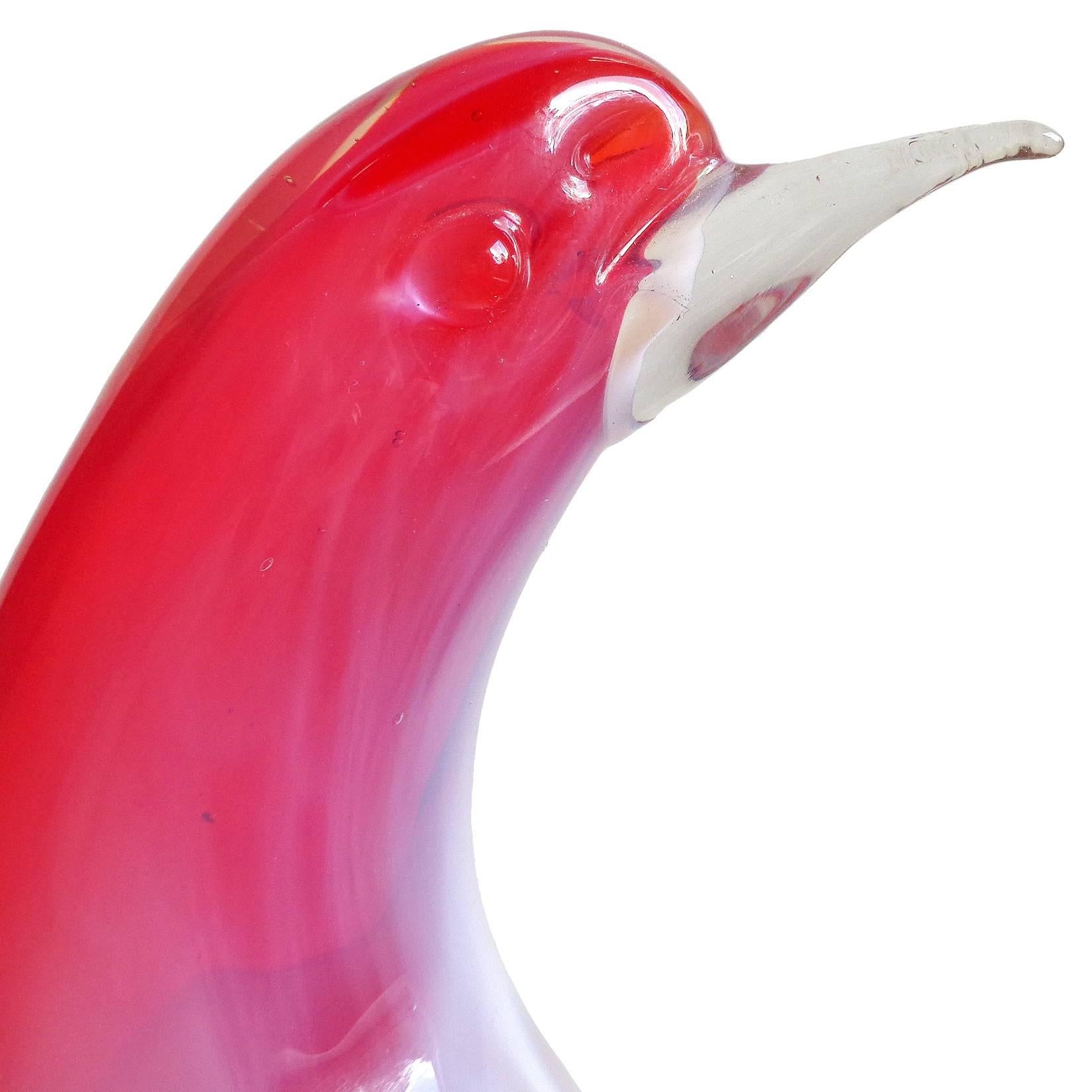 Gorgeous Murano handblown red and white opalescent Italian art glass bird sculpture. The piece is designed by, and signed Berto Toso, 1966. It measures 10 3/4