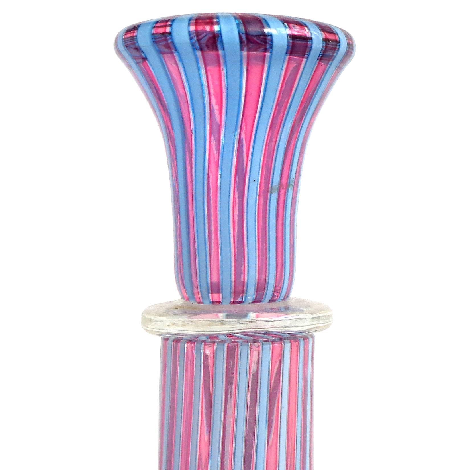 Large Murano handblown purple and light blue filigrana ribbons Italian art glass decanter. Documented to the Fratelli Toso Company, with original Murano label underneath. Gorgeous piece! Measures: 17