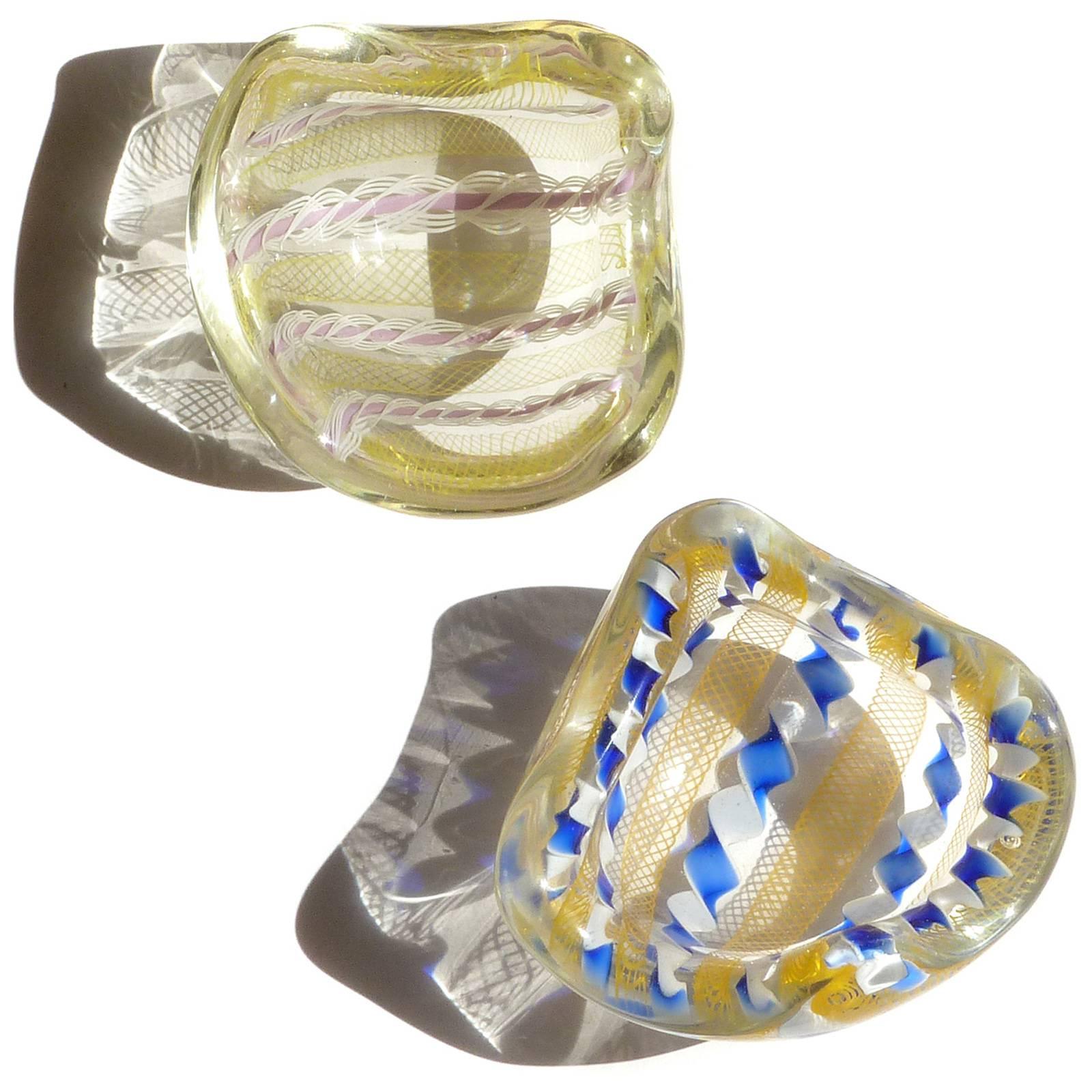 Priced per item - Beautiful Murano handblown Zanfirico and Latticino twisted ribbon art glass dishes. Documented to designer Archimede Seguso, circa 1950s. Published design (last photo). Perfect for earrings or rings. They measure about 3 3/4
