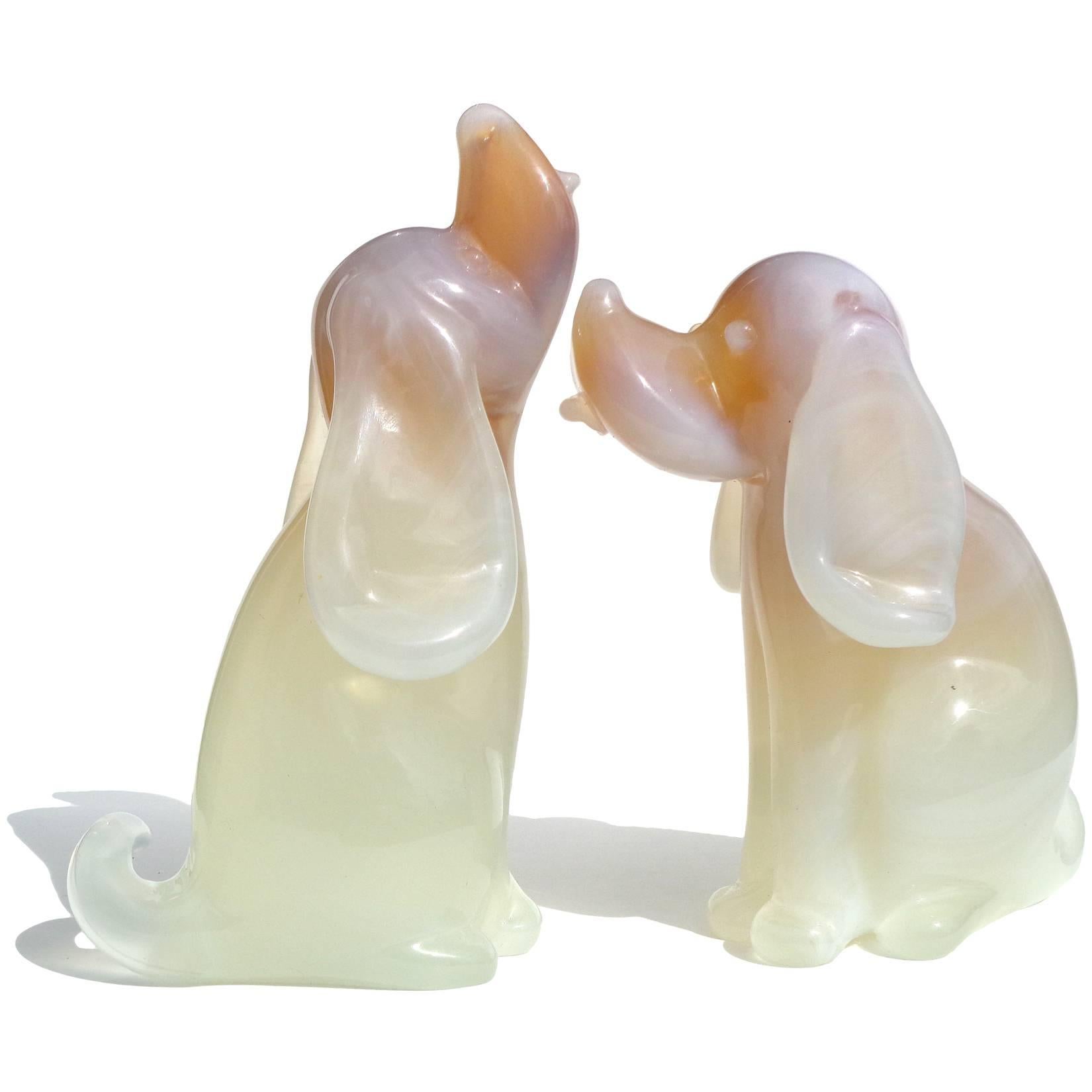 Rare set of large Murano handblown opalescent and caramel swirl / marbled art glass puppy dogs. Documented to designer Archimede Seguso. Believe they are Basset hounds or Beagle dogs. Very unusual technique. A must for the dog lover in your family.
