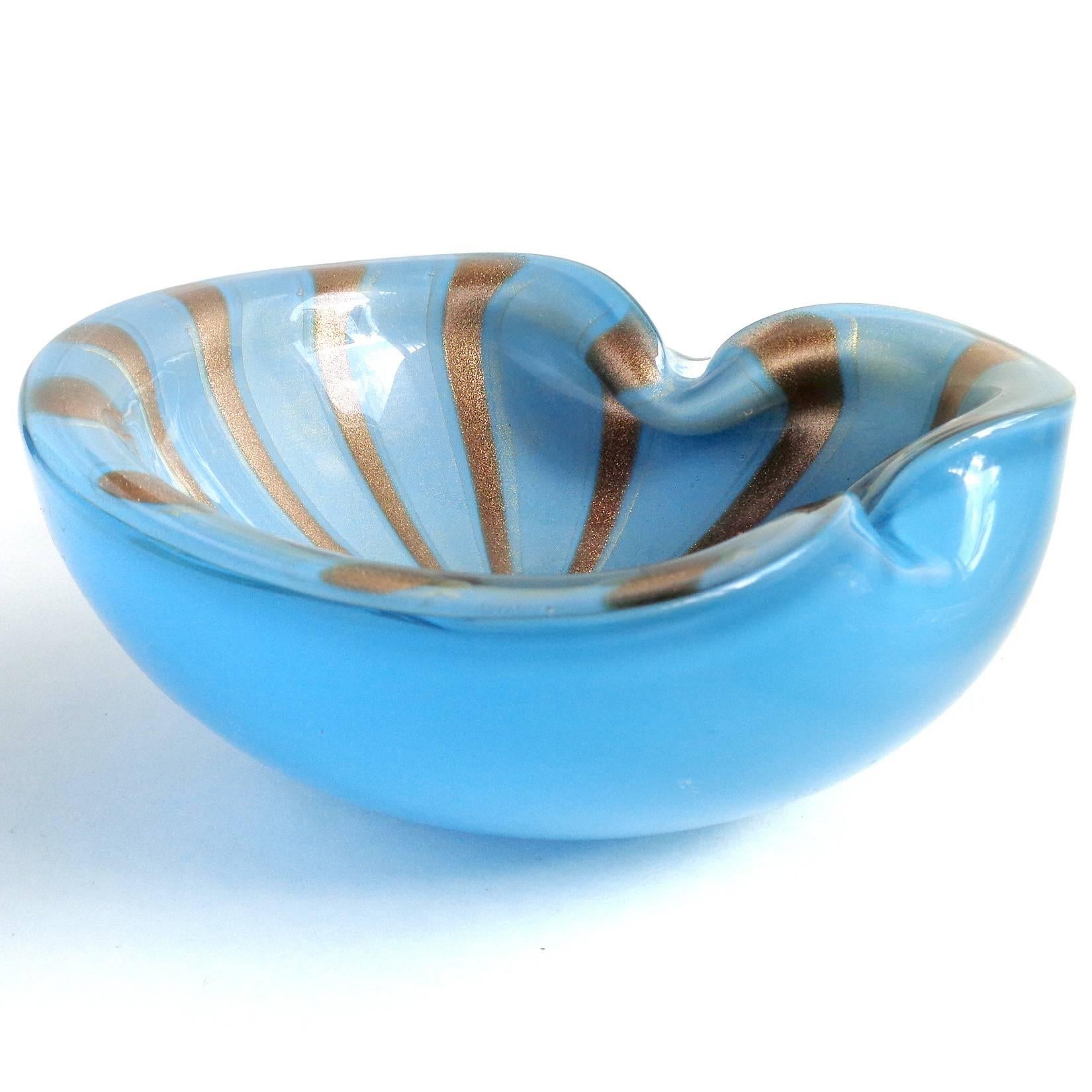 Free shipping worldwide! See details below description.

Gorgeous and large Murano handblown blue, gold and aventurine flecks art glass bowl. Documented to designer Alfredo Barbini, circa 1950-1960s. The piece measures 8 1/4