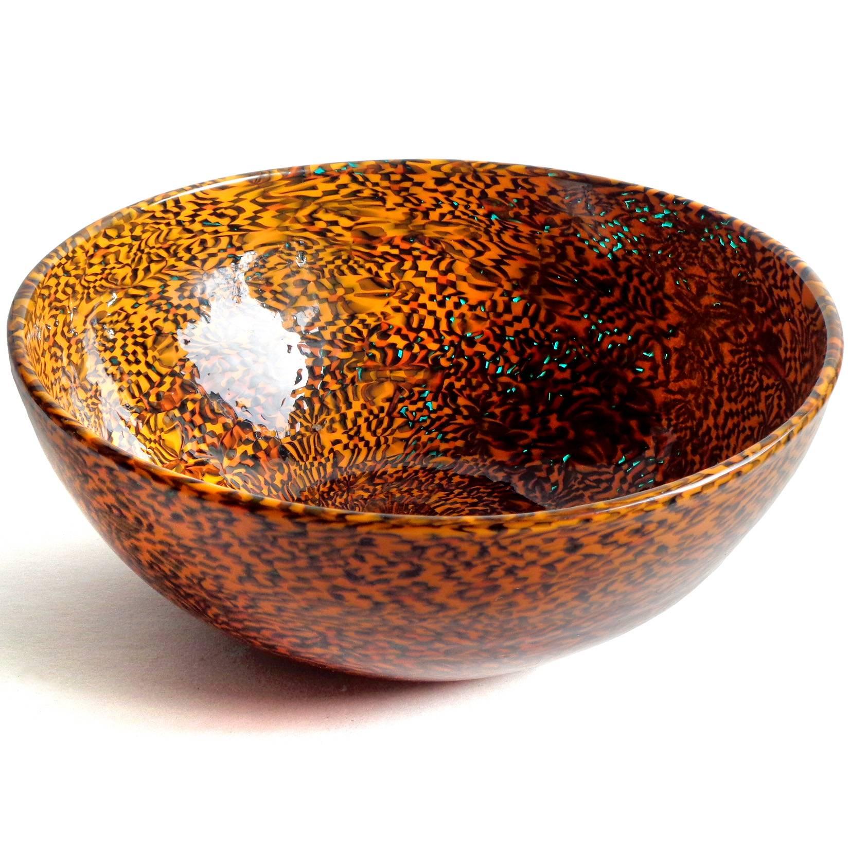 Free shipping worldwide! See details below description.

Rare and large Murano handblown orange and black murine art glass bowl. Documented to designer Paolo Venini, for Venini e Co., circa 1950s. The piece has an unusual blended checkered design.
