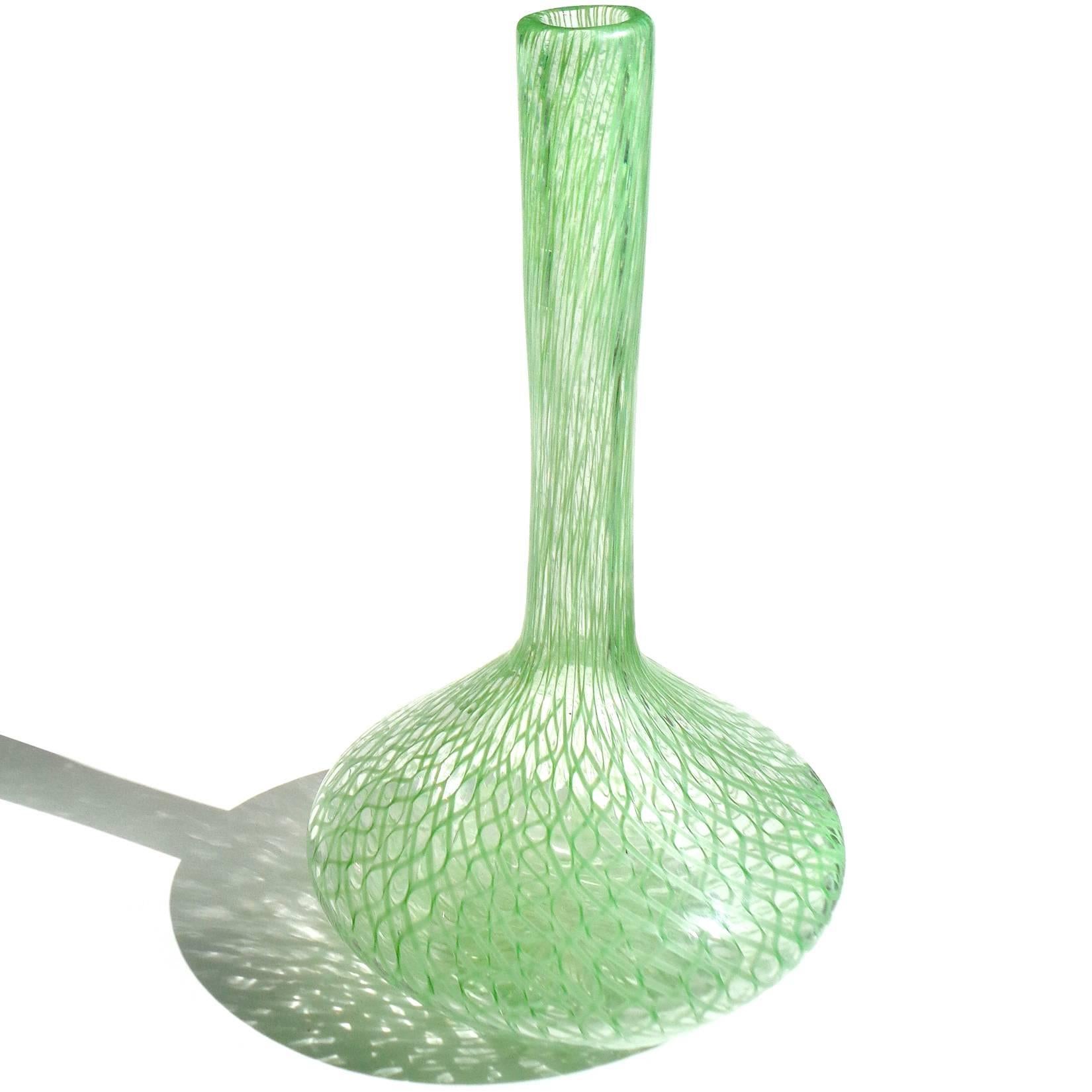 Free shipping worldwide! See details below description.

Rare large Murano handblown green Zanfirico ribbons art glass flower vase. Documented to designer Dino Martens, for Aureliano Toso, circa 1958. 

Please look at my exclusive 1stdibs
