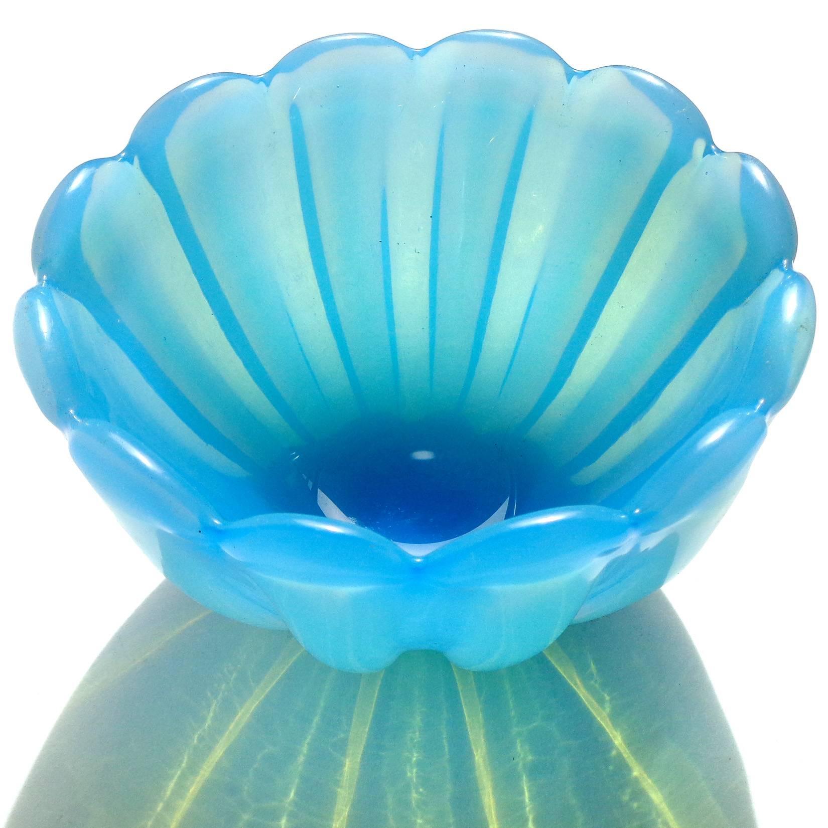 FREE Shipping Worldwide! See details below description.

Beautiful Murano hand blown opalescent blue and white art glass bowl. Documented to the Fratelli Toso company. Has a scalloped rim and is very deep, perfect for candy. 

Please look at my
